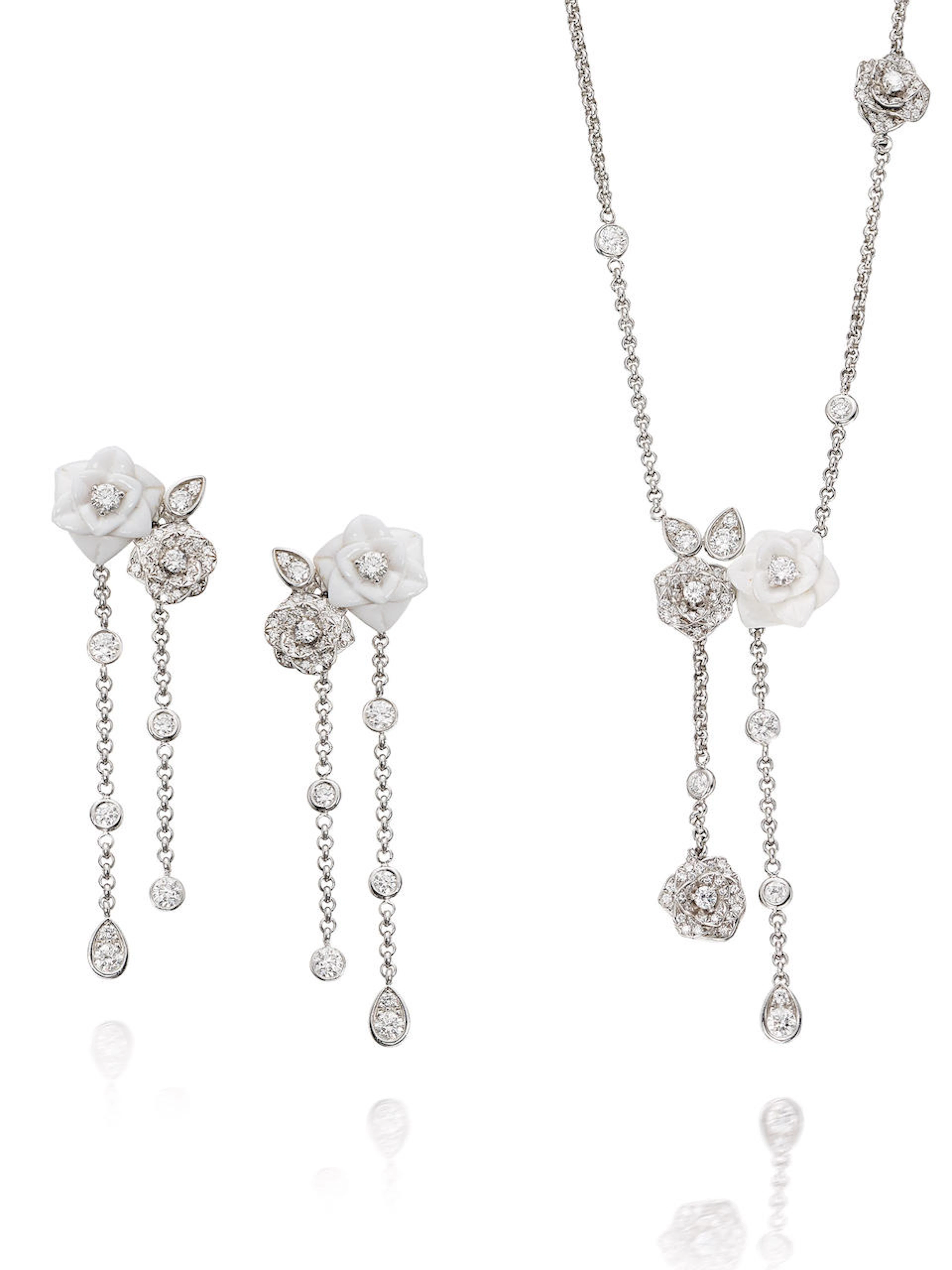 PIAGET: A CERAMIC, DIAMOND AND 18K WHITE GOLD NECKLACE AND EARRING SET (2)