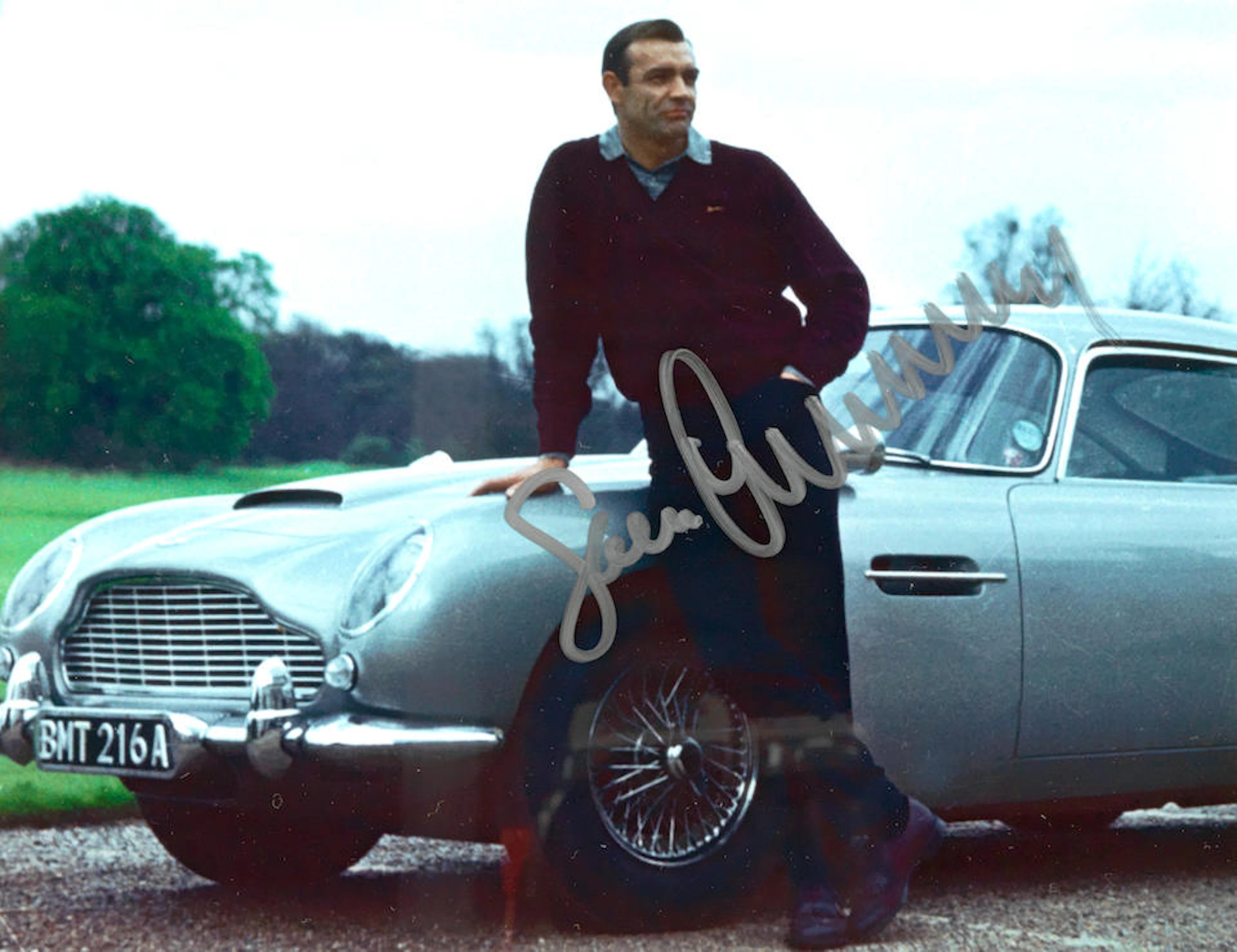 A signed photograph of Sean Connery as 007 at Stoke Park...