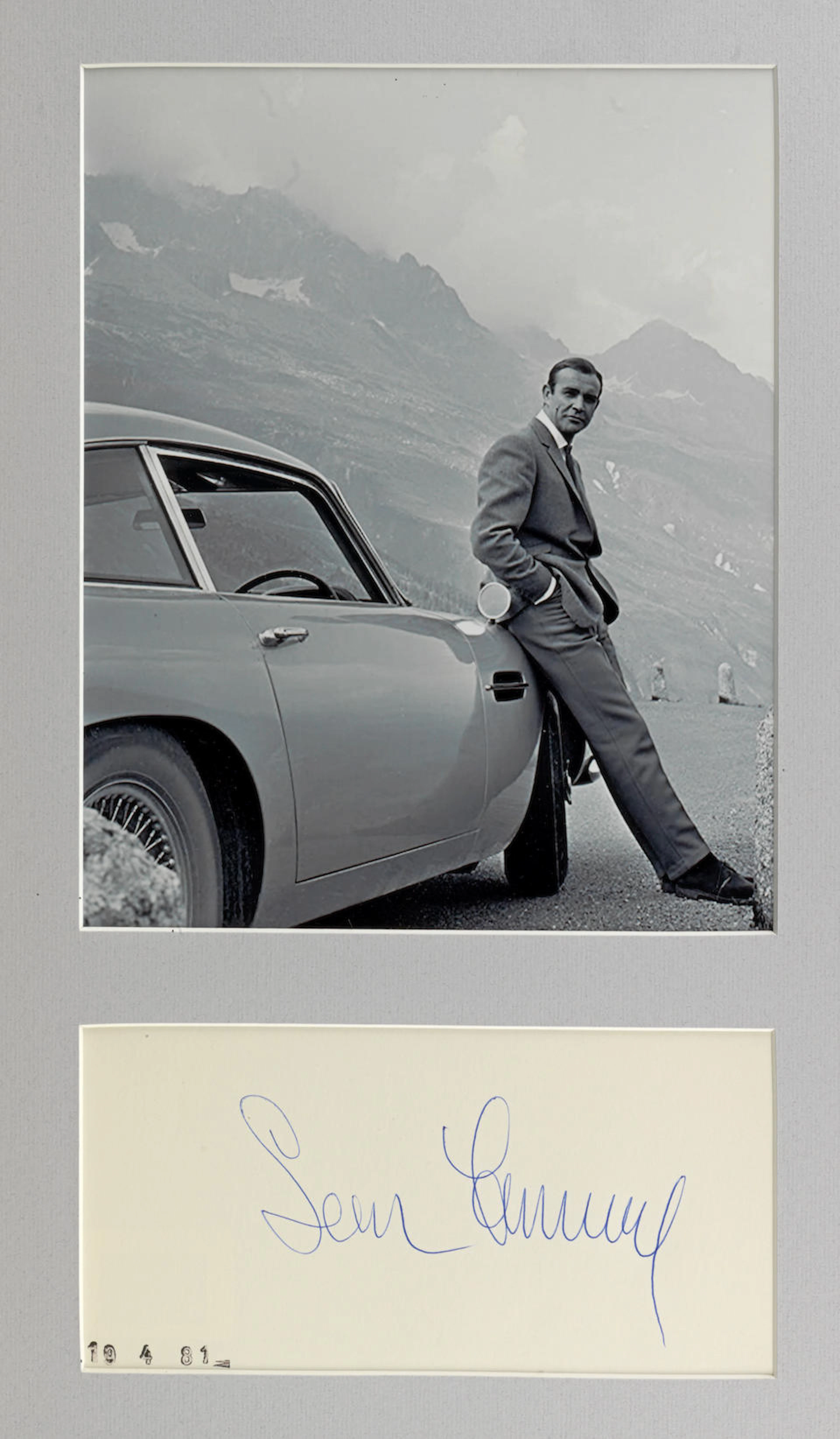 A photograph with signature of Sean Connery with the...