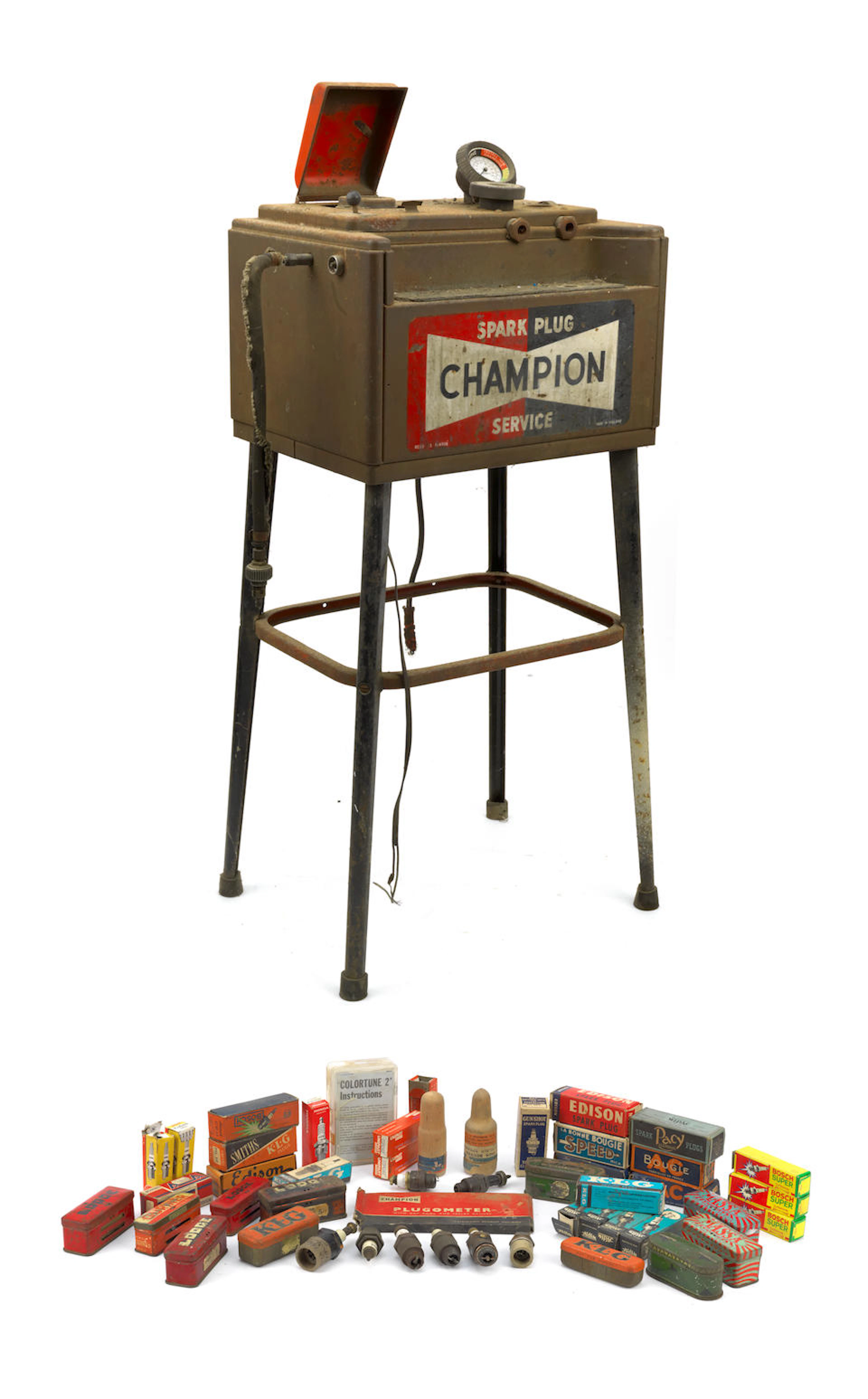 Assorted boxed spark plugs, tins and a spark plug tester unit, ((Qty))