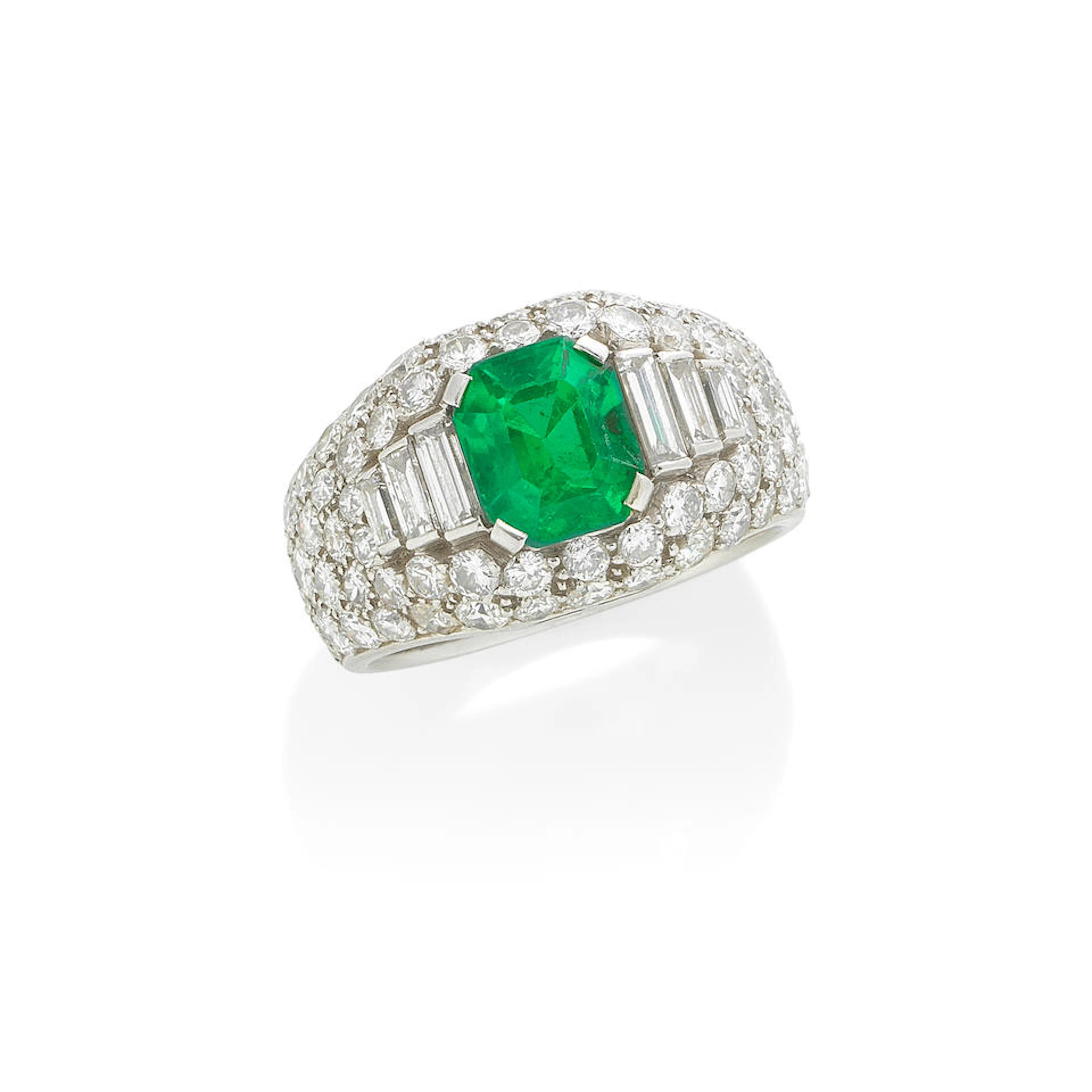 BULGARI: EMERALD AND DIAMOND 'TROMBINO' RING, CIRCA 1965