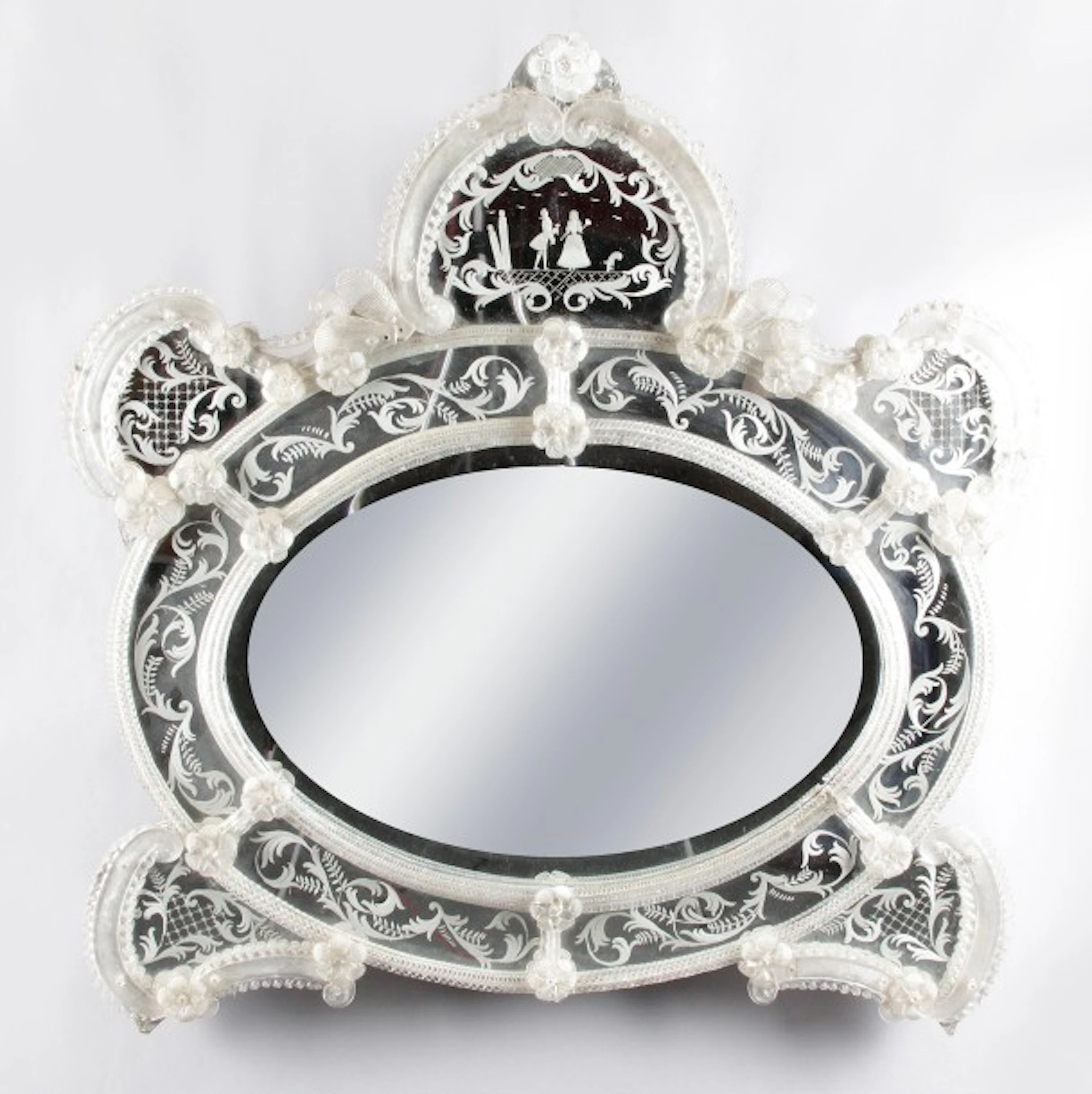 MIROIR VENITIEN à PARECLOSES de forme contournée à décor de fleurs...