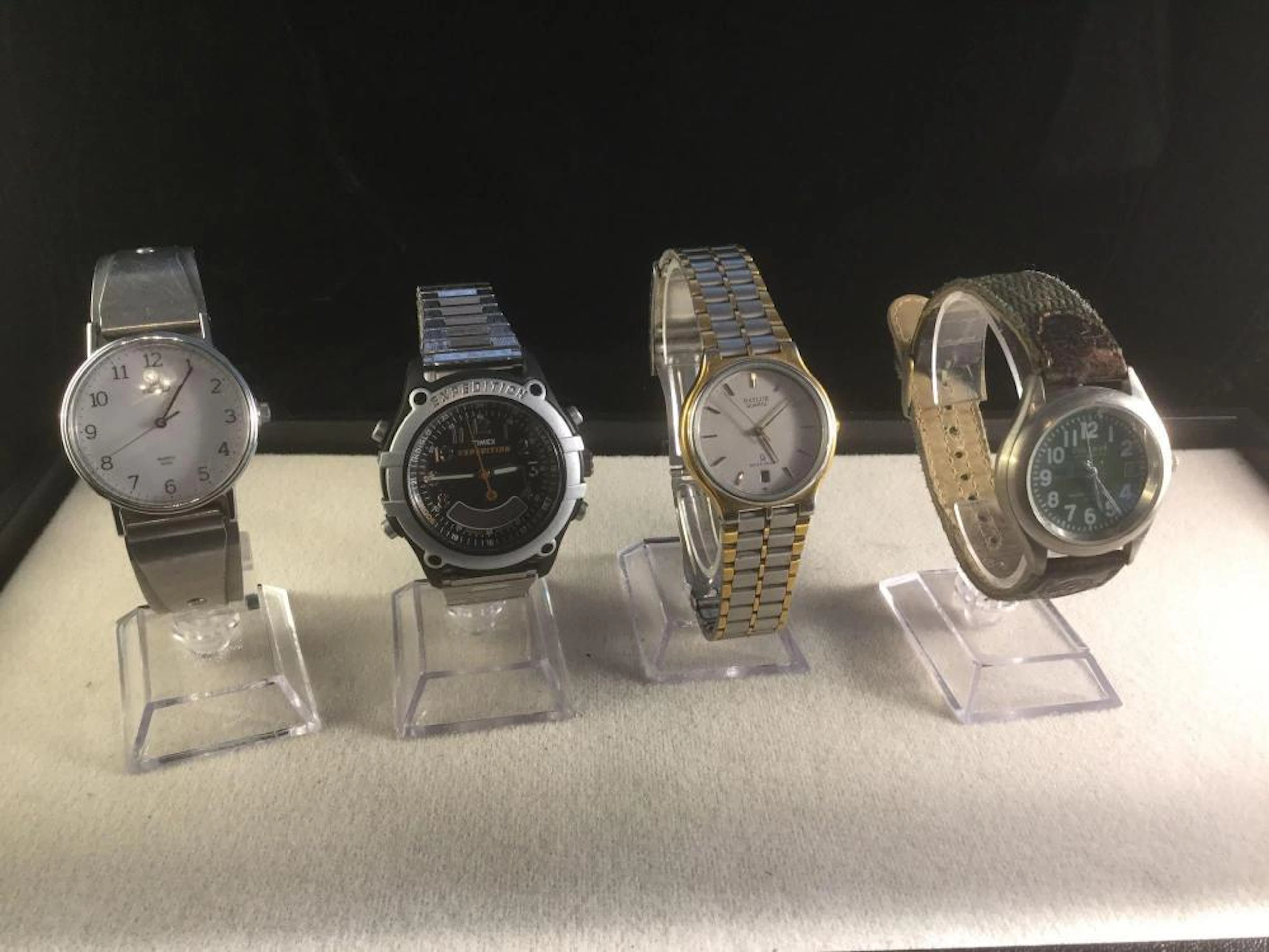 Nice set of 4 vintage men?s watches, Baylor, Coleman, and Timex