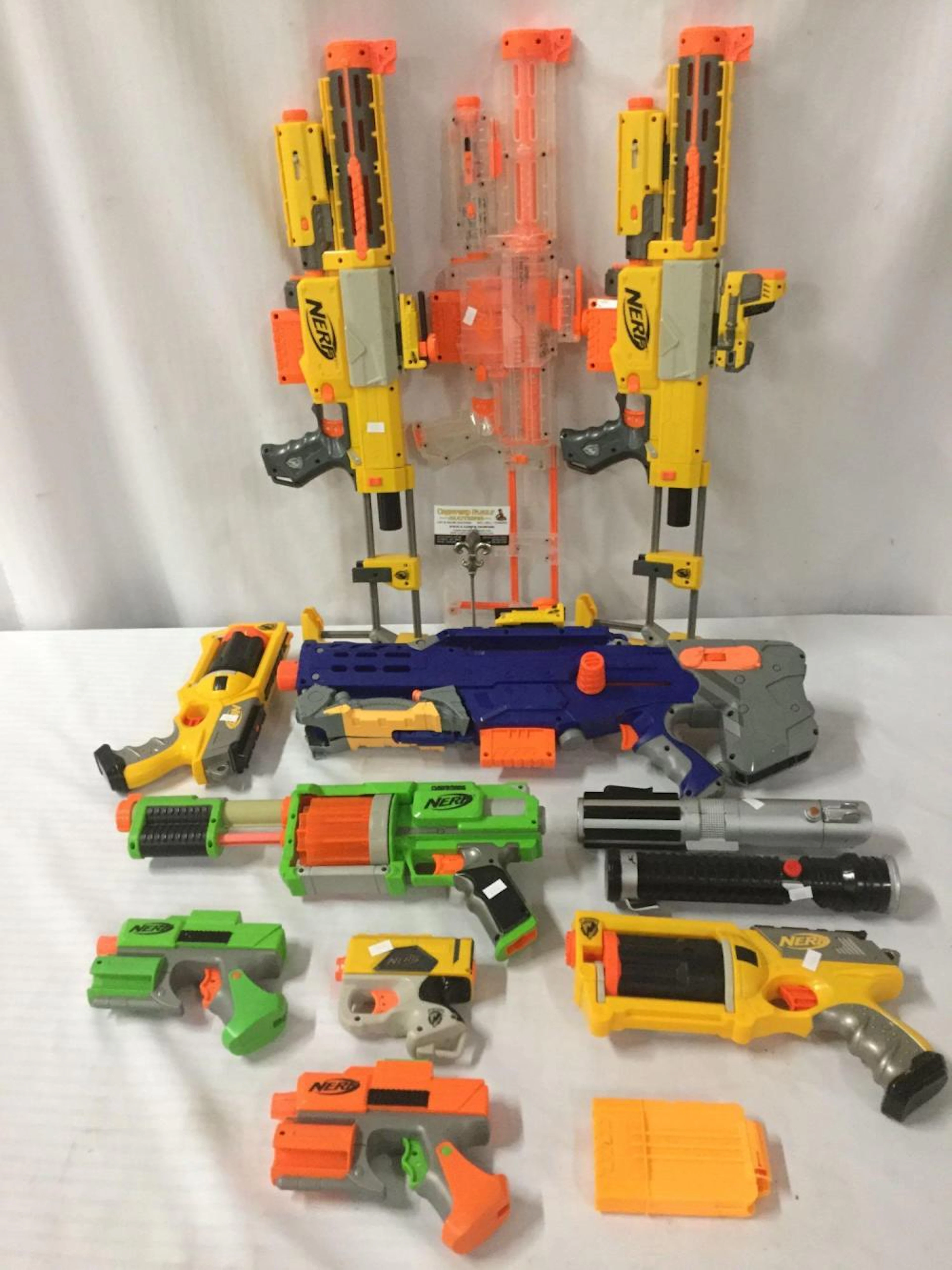 Lot of 10 NERF plastic toy guns plus 2 Hasbro Star Wars lightsabres
