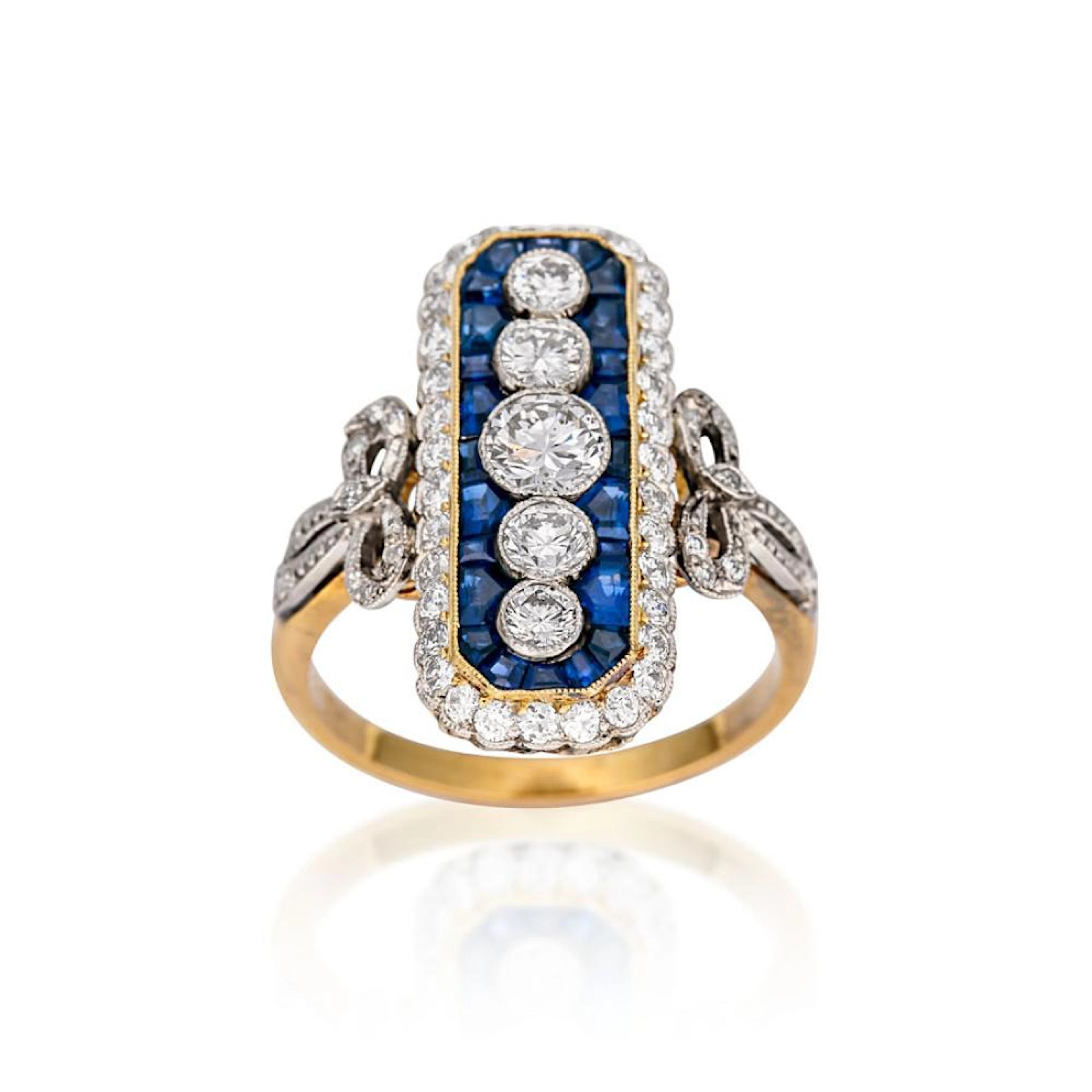 Platinum, 18ct gold, sapphire and diamond ring