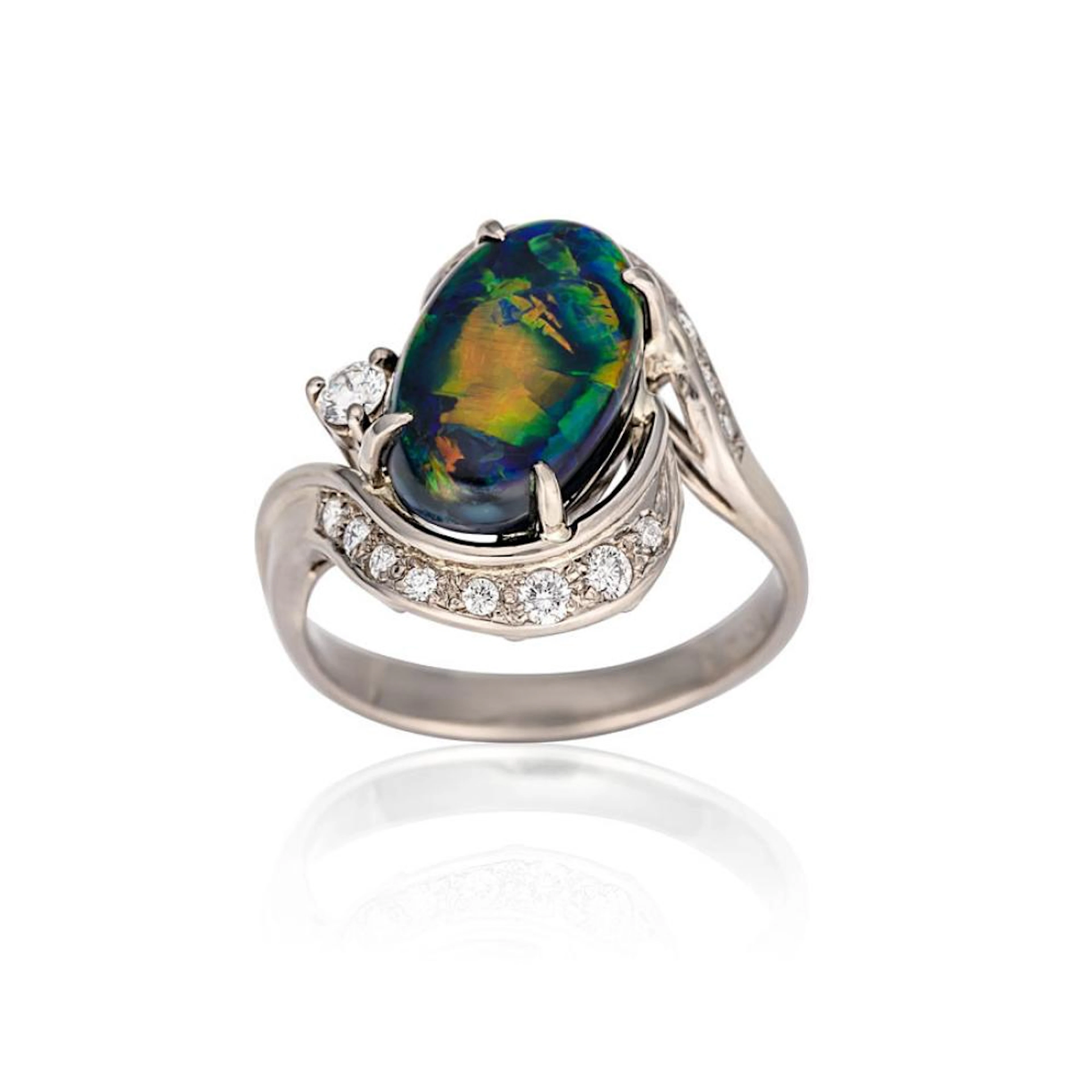 A fine black opal and diamond ring