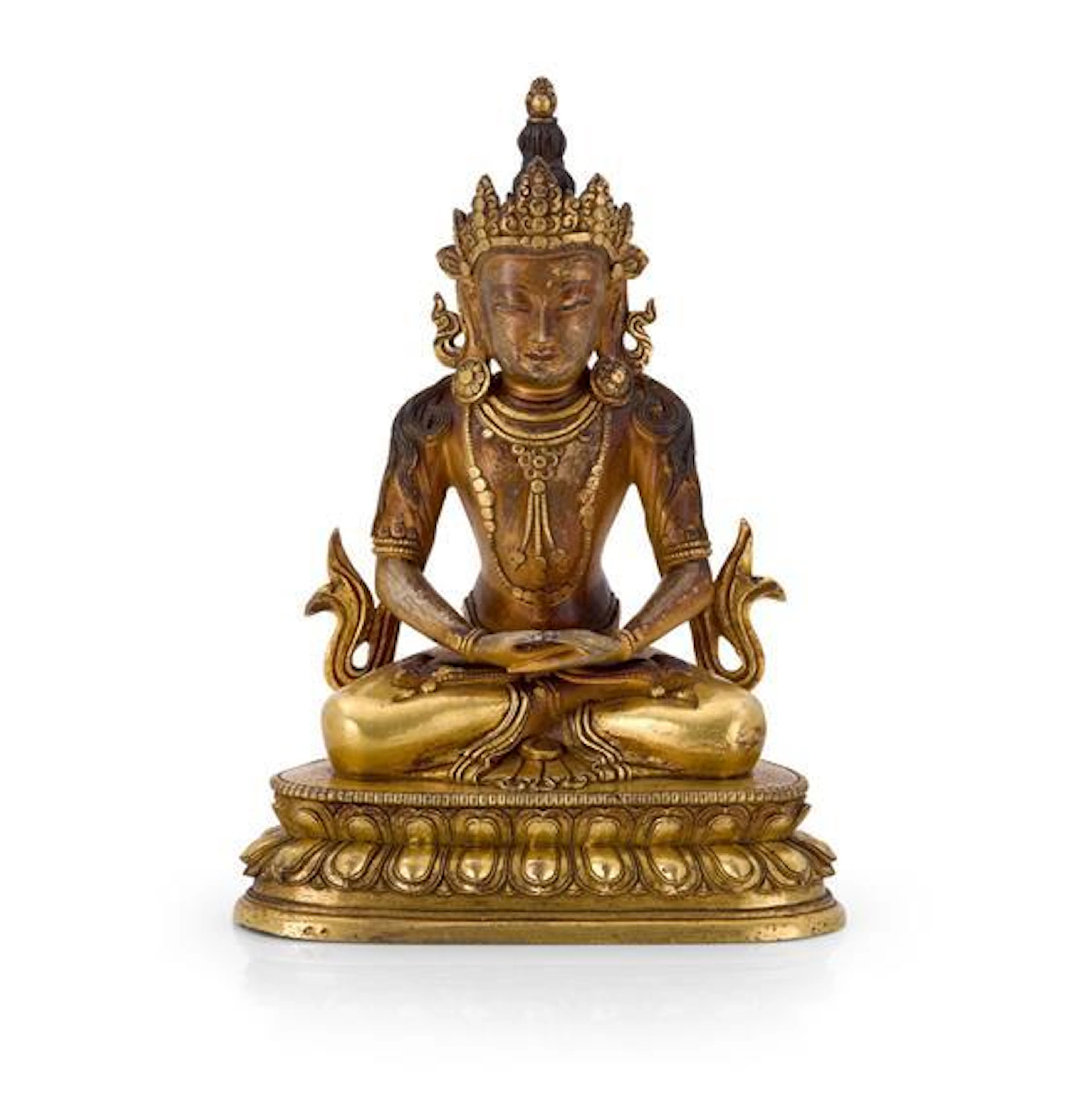 A gilt bronze figure of Amitayus Qing dynasty, 18th century 22.5 cm high