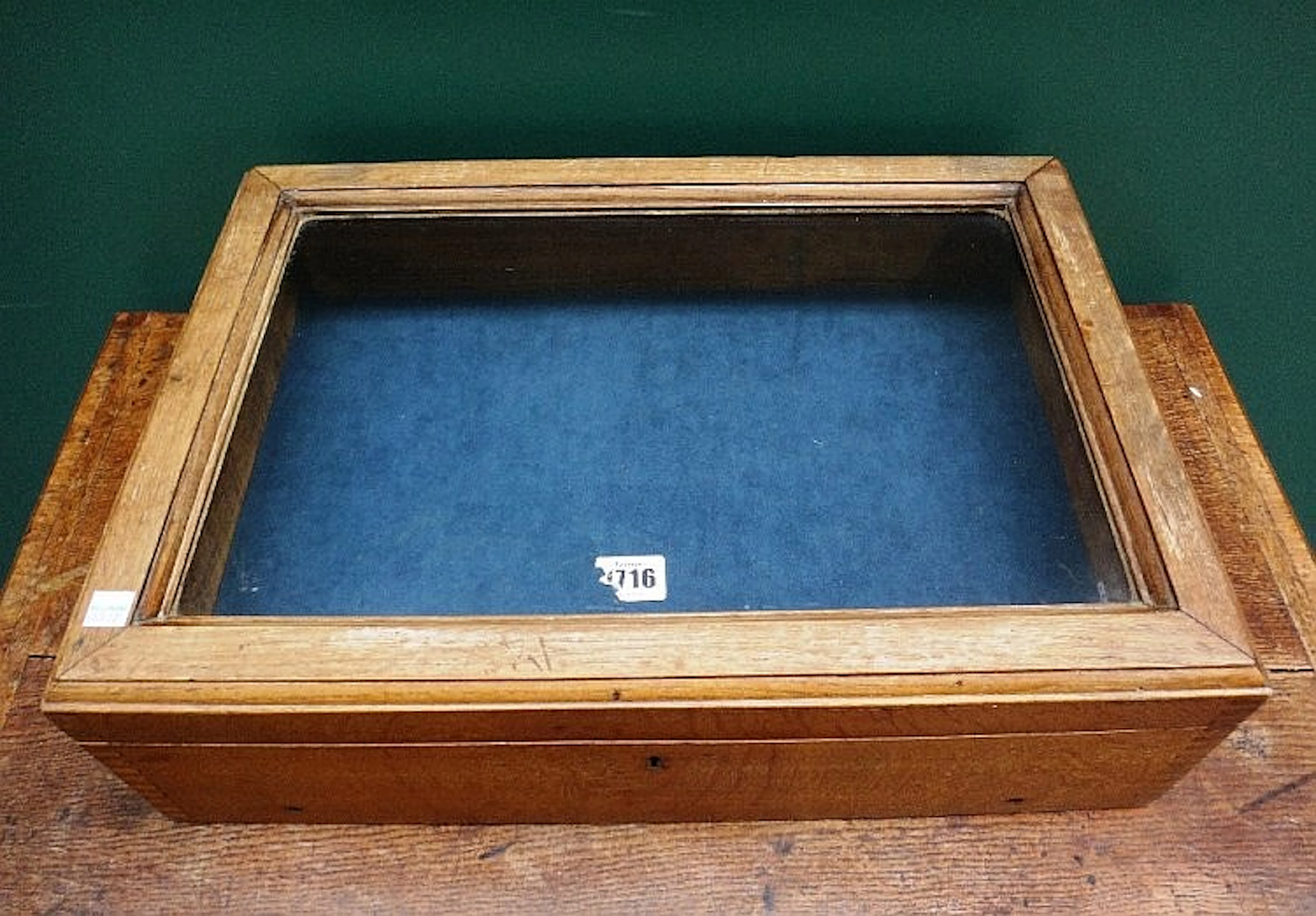 An early 20th century oak framed rectangular table top display cabinet with