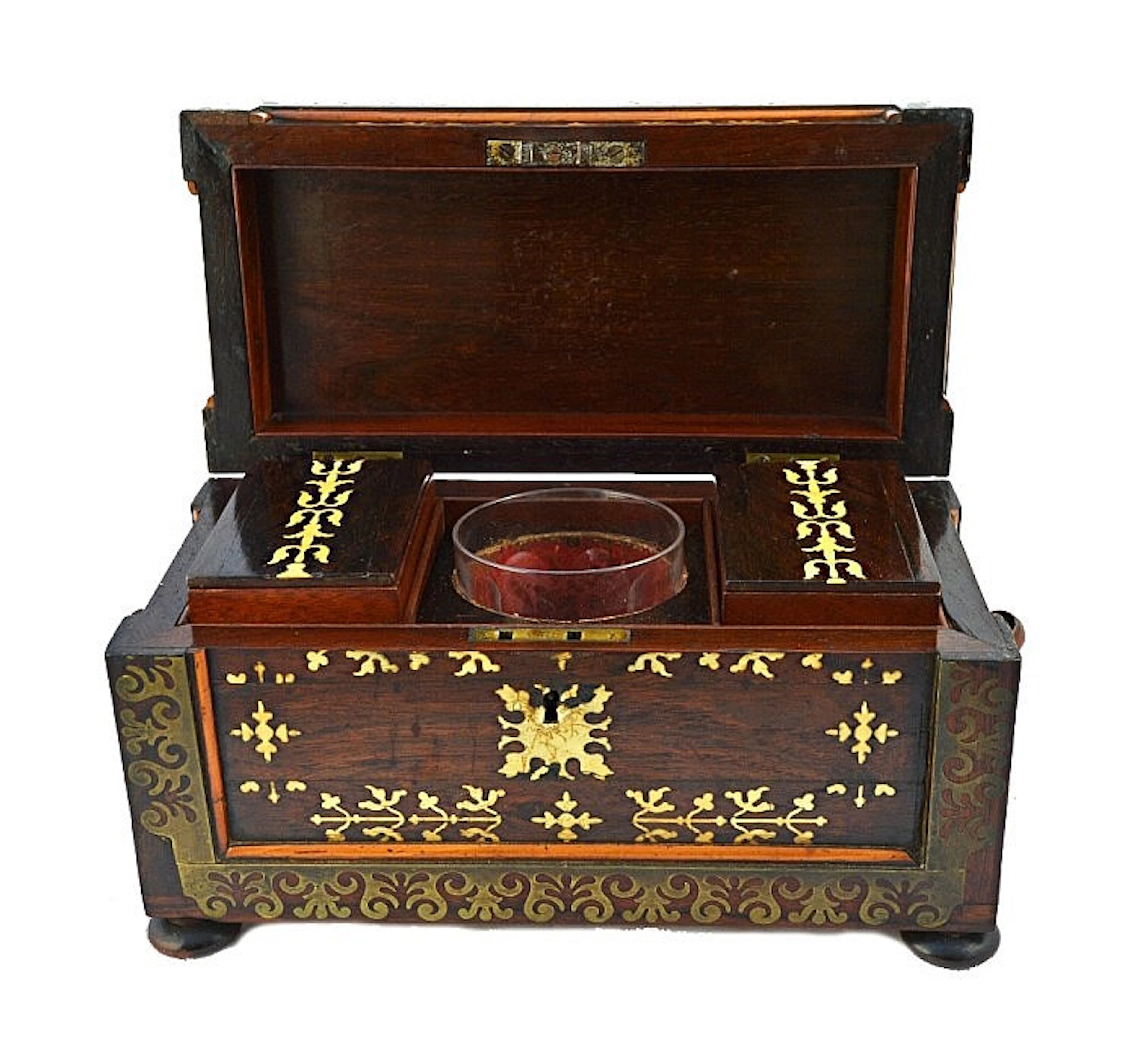 A Regency brass and bone inlaid rosewood rectangular tea caddy, with twin l