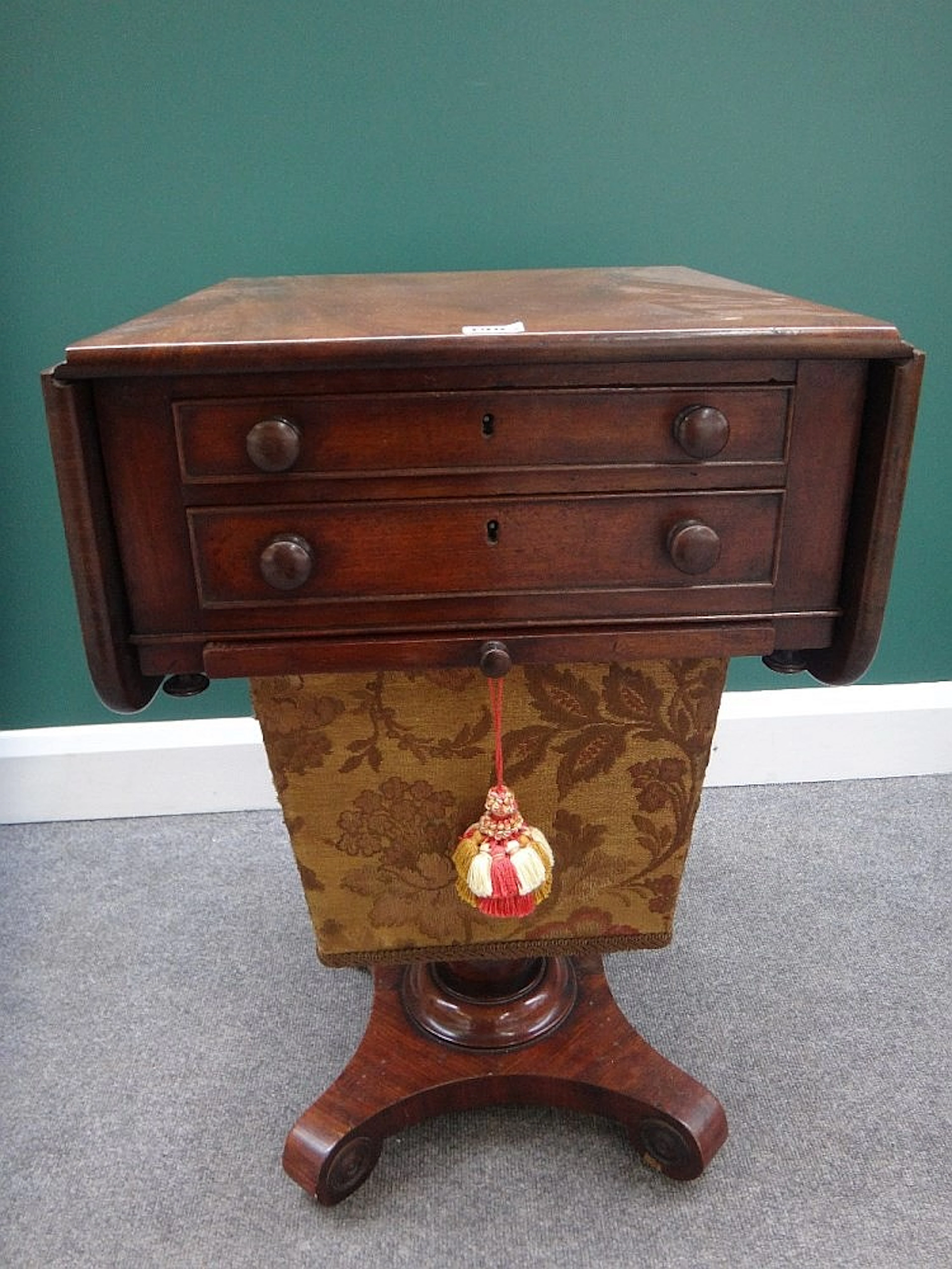 A William IV mahogany drop flap sewing table, with a pair of frieze drawers