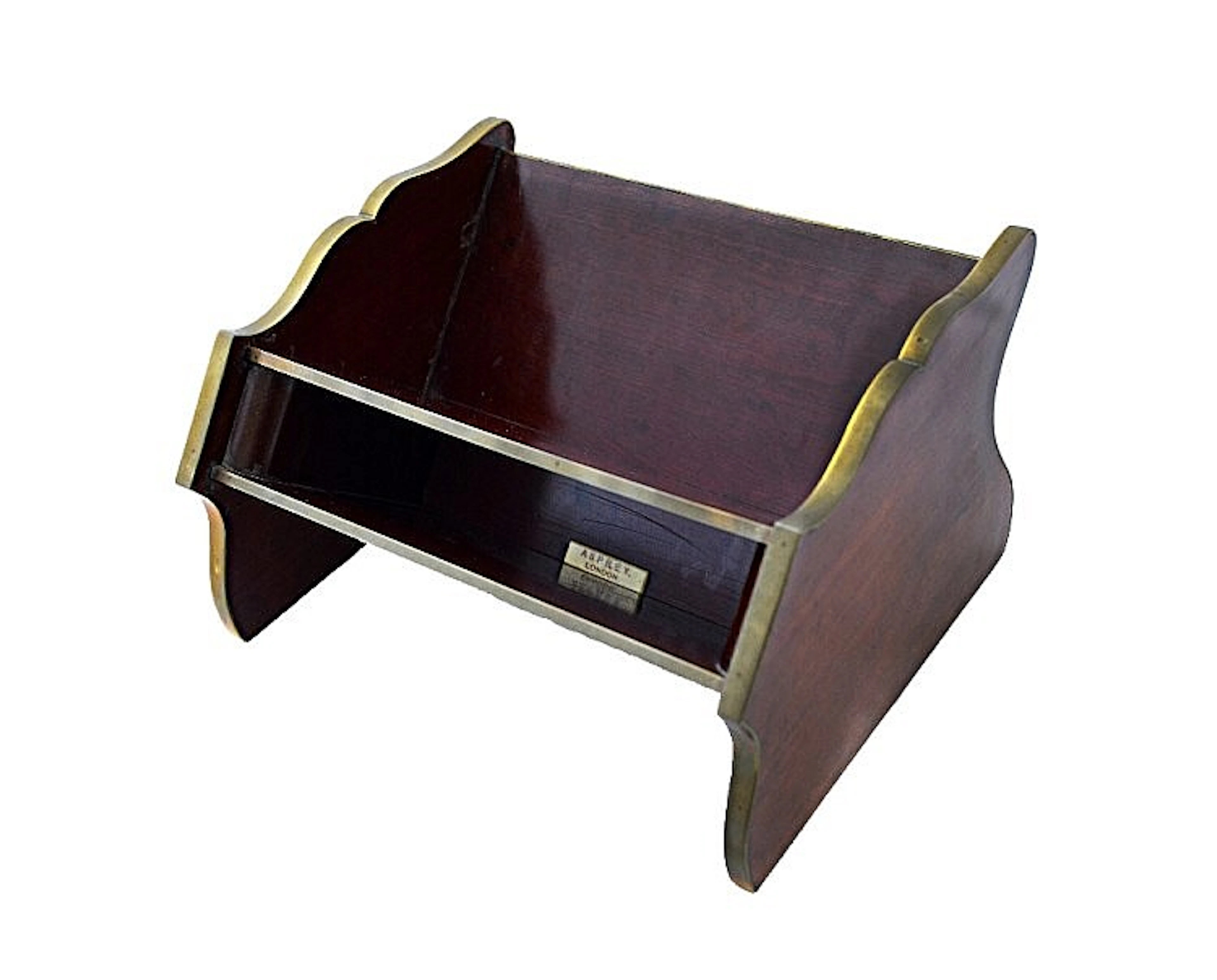 A lacquered brass mounted book trough with maker's plaque for 'Asprey, Lond