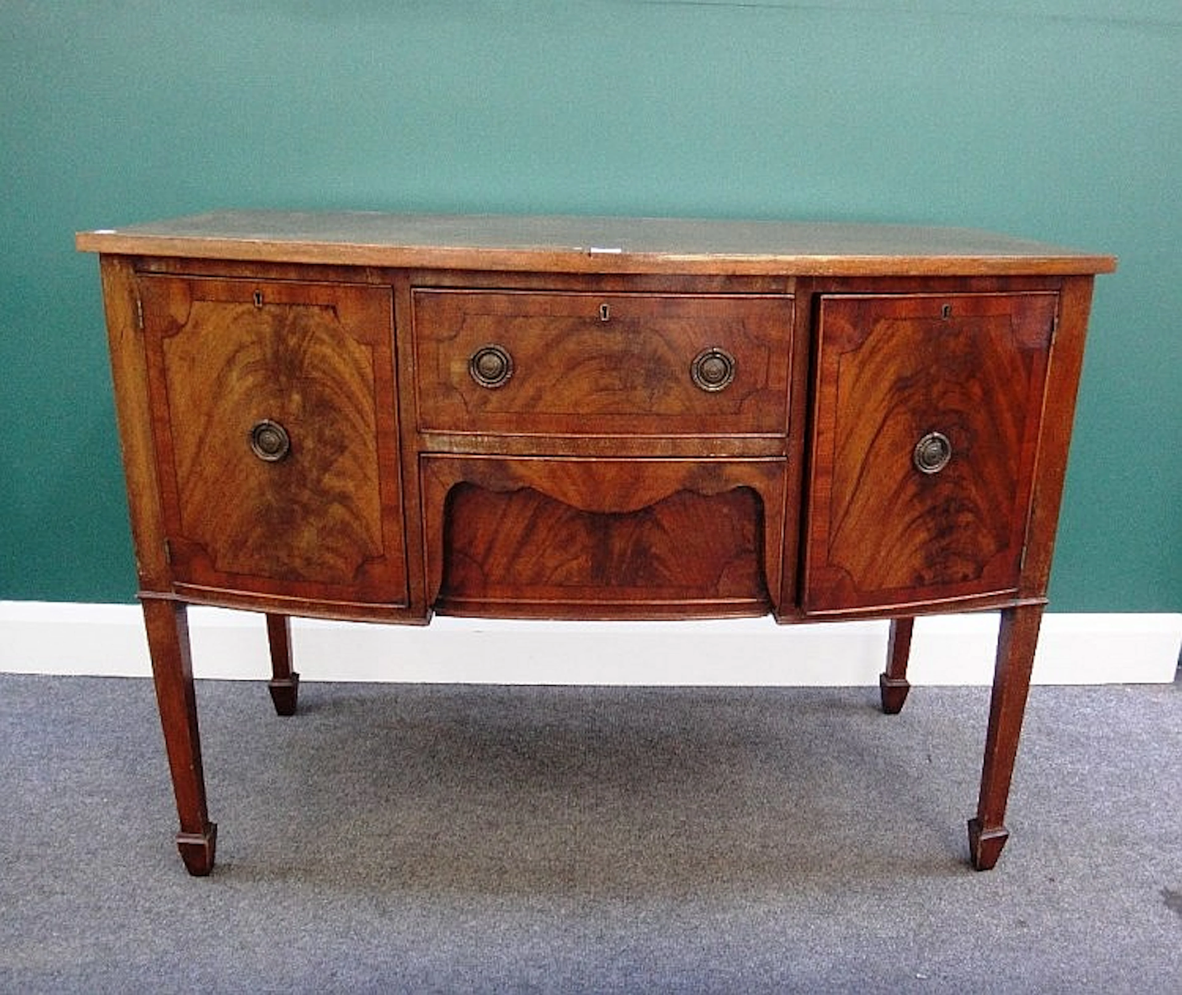A 19th century inlaid mahogany bowfront sideboard with pair of central draw