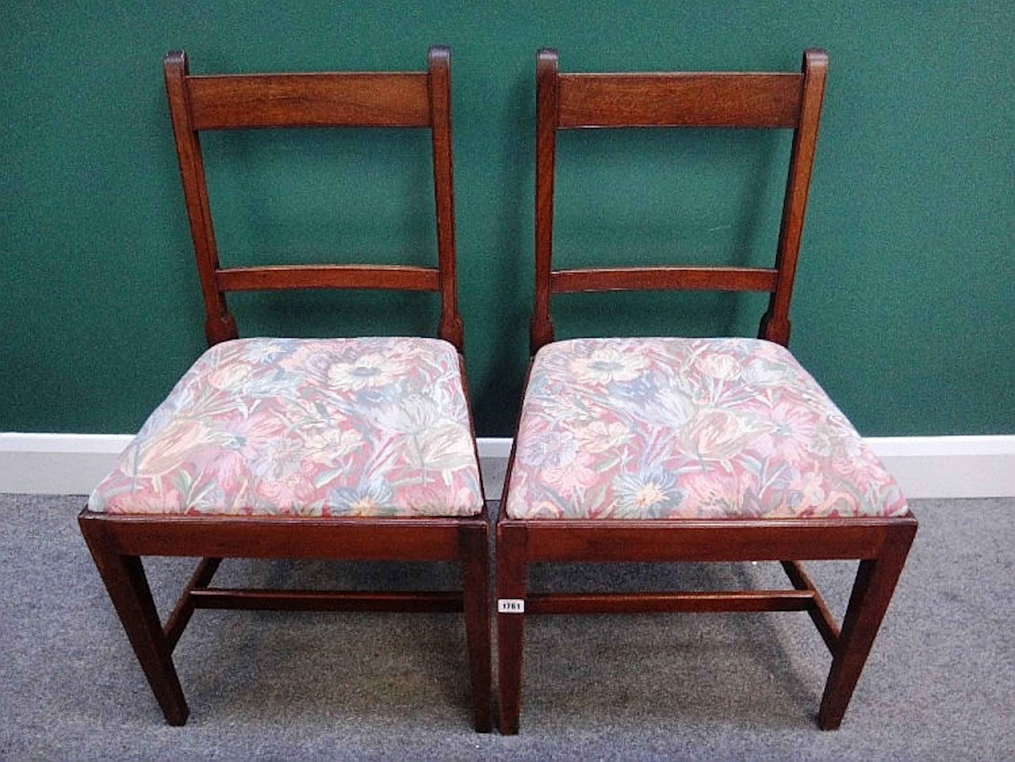 A set of six early 19th century mahogany bar back dining chairs on tapering