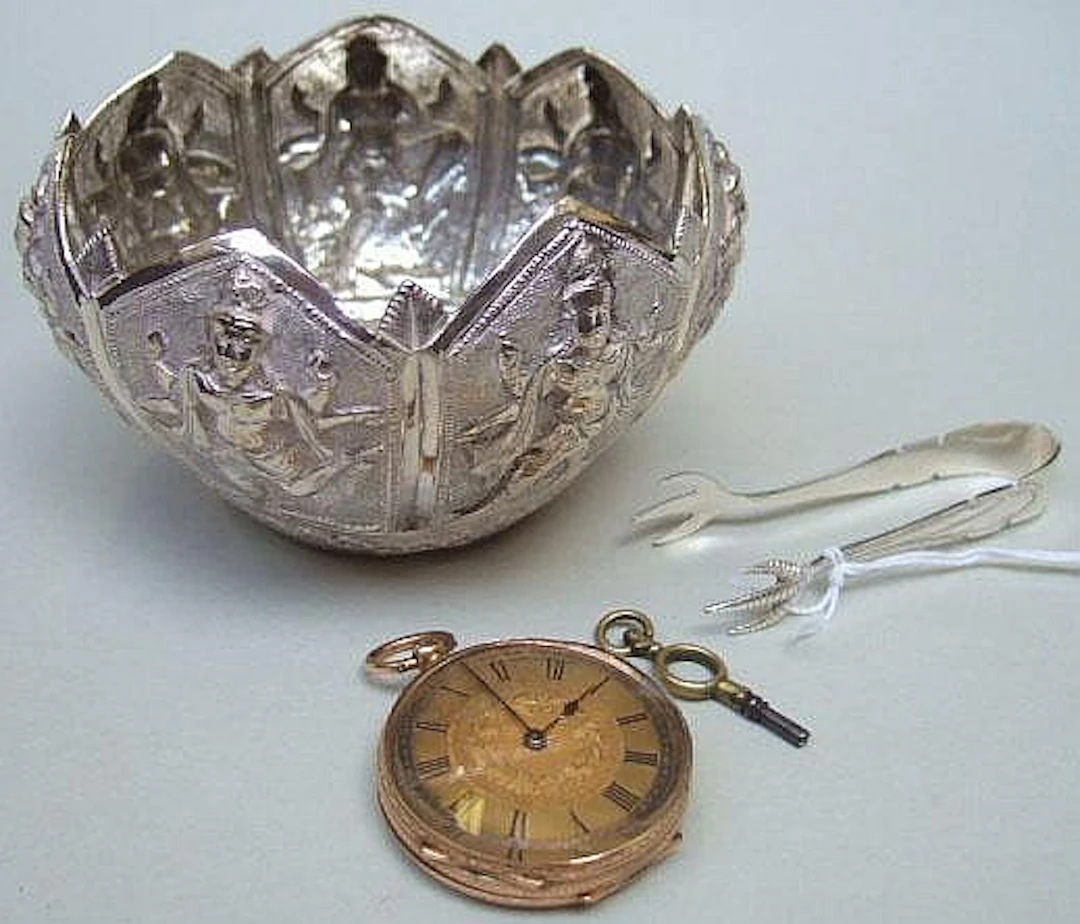A ladies gold cased, openfaced fob watch, detailed