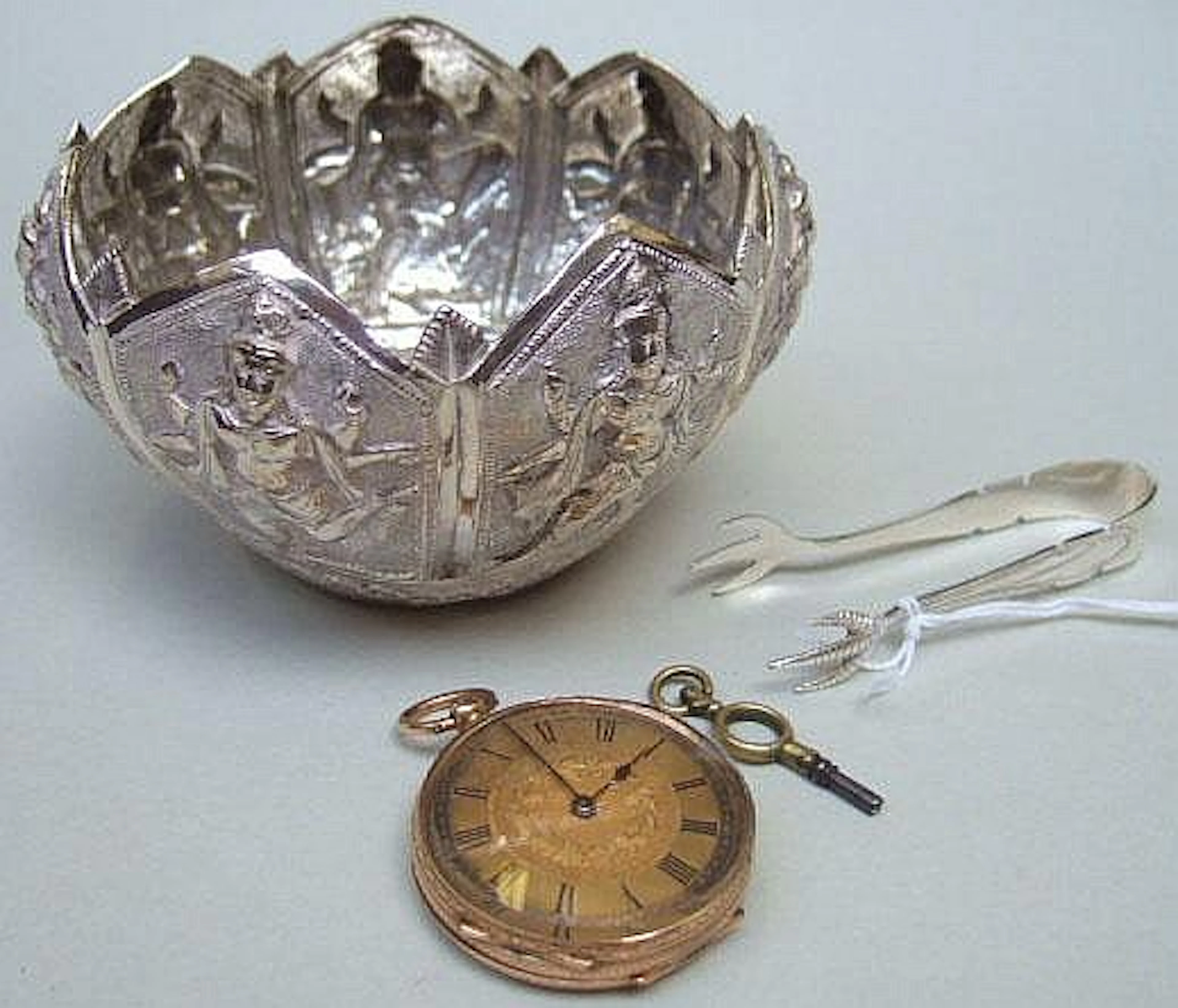 A ladies gold cased, openfaced fob watch, detailed