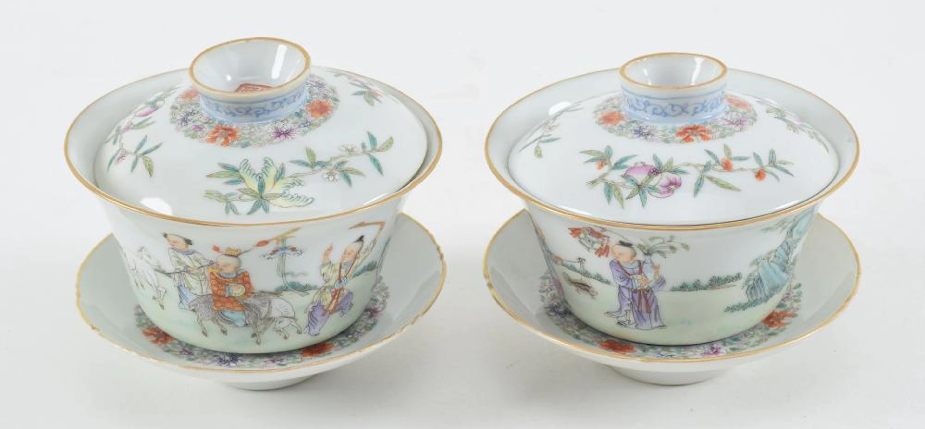 Pair of covered cups and saucers