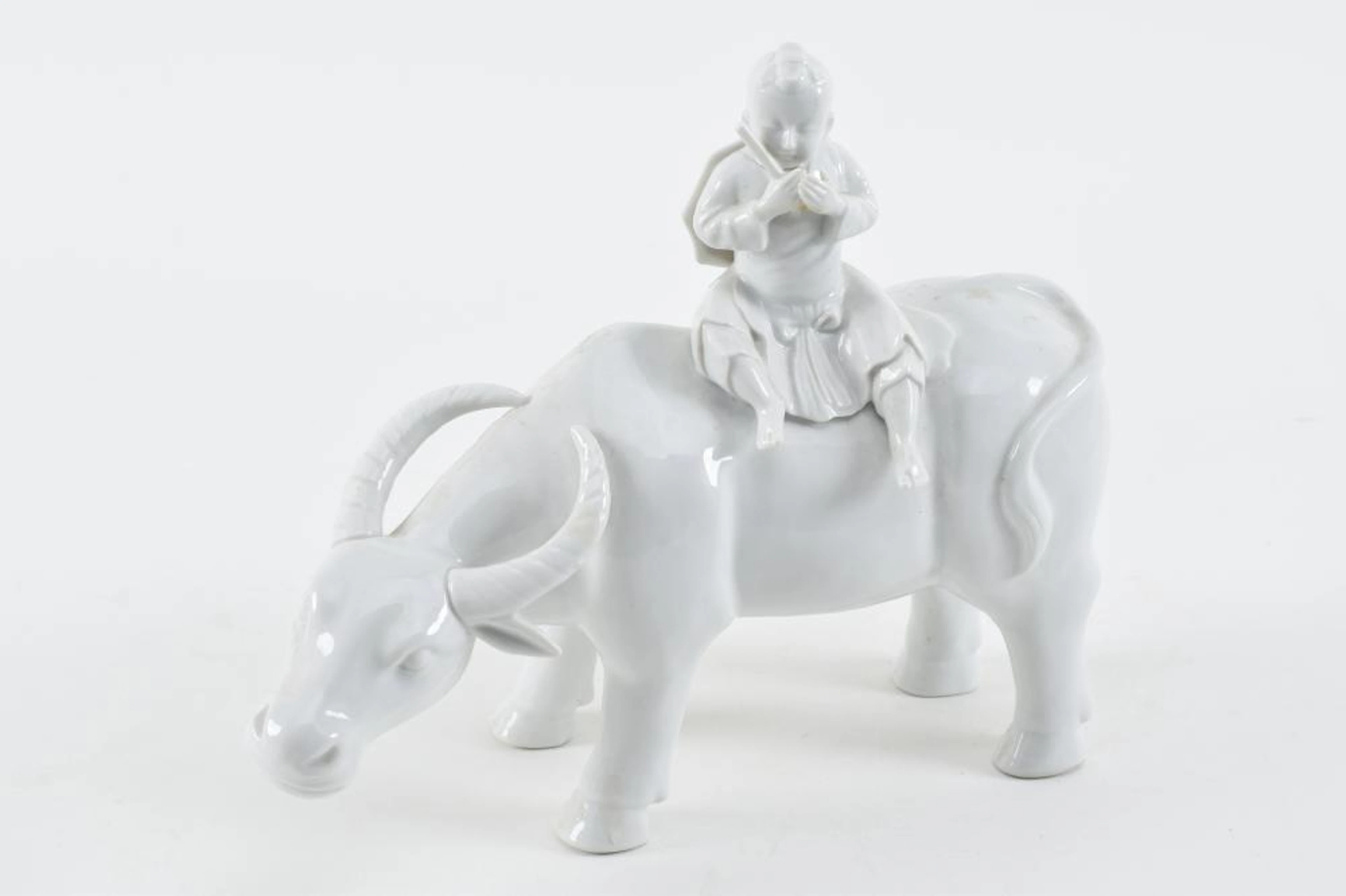 Chinese export porcelain Blanc de chine water buffalo with child riding