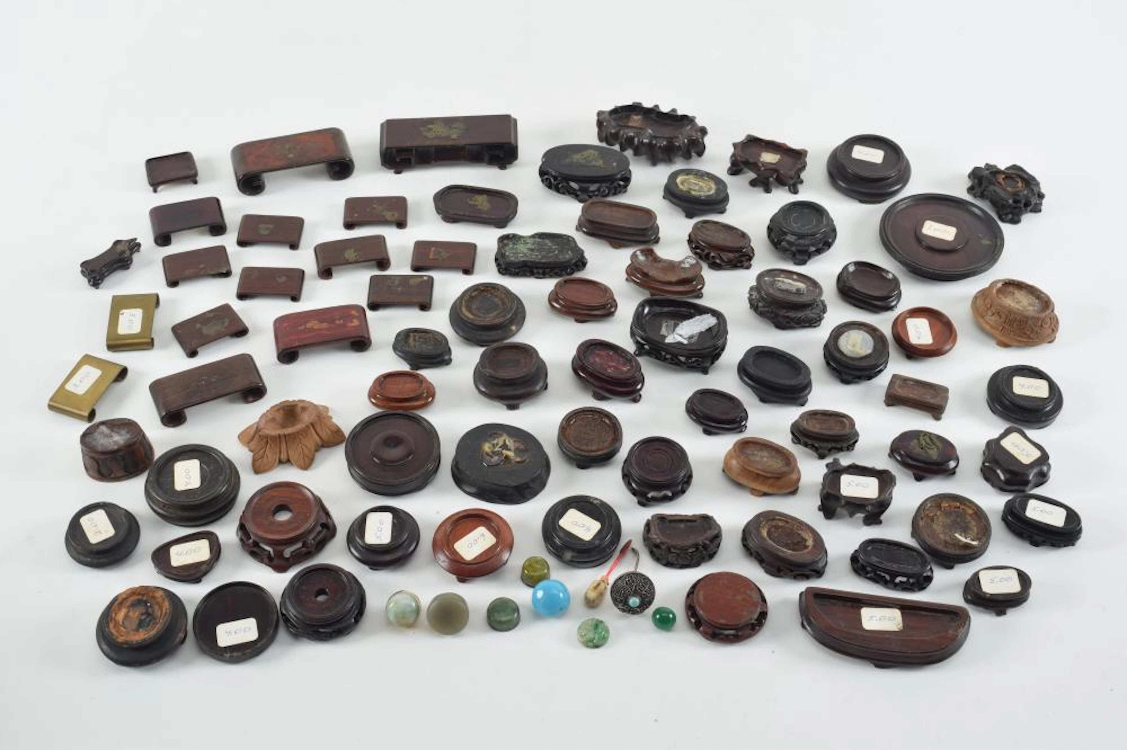 Lot of approximately 50 carved miniature stands