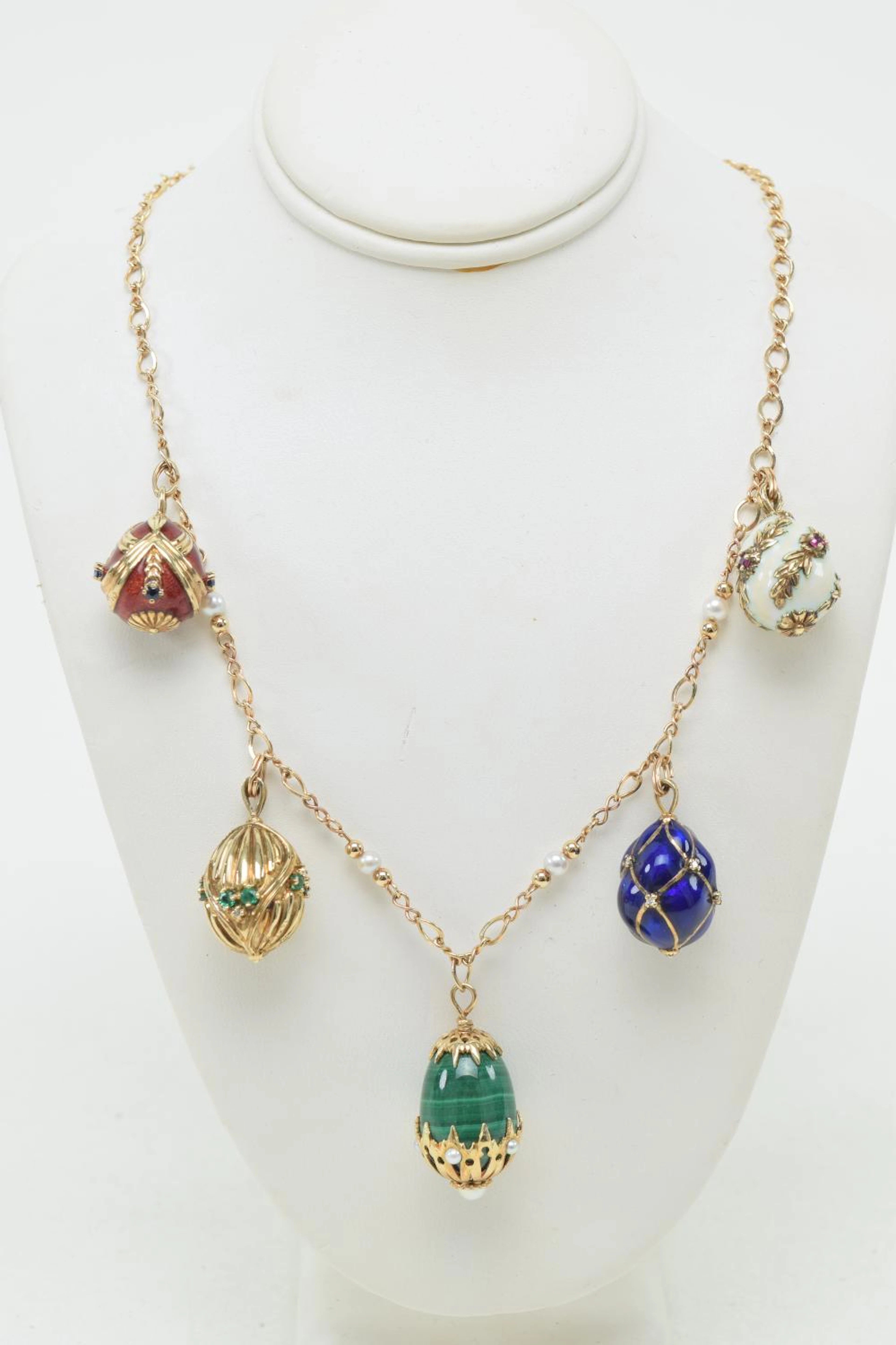 Faberge style egg necklace. Contains 5 unique eggs.