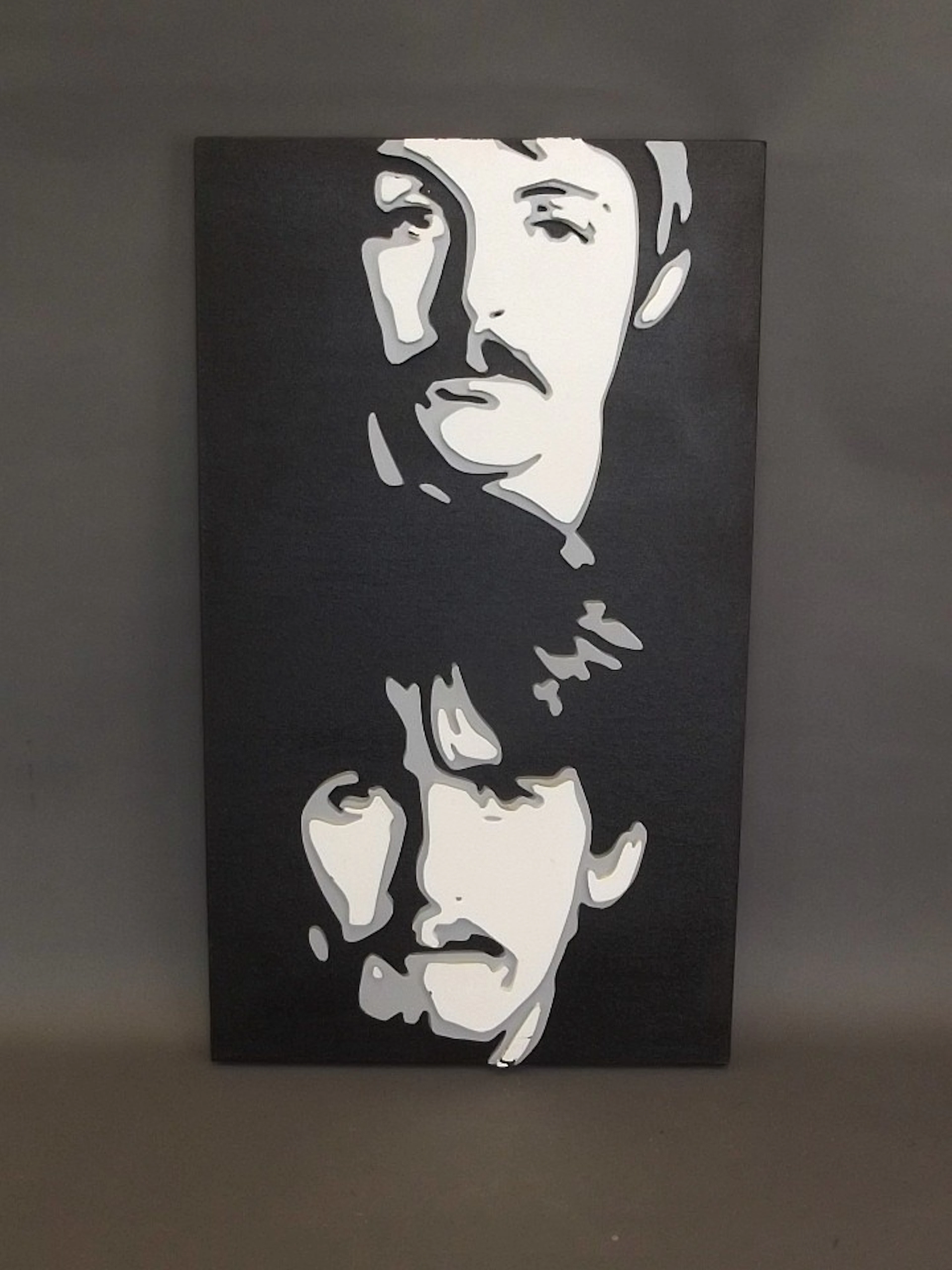 A contemporary mixed media silhouette artwork