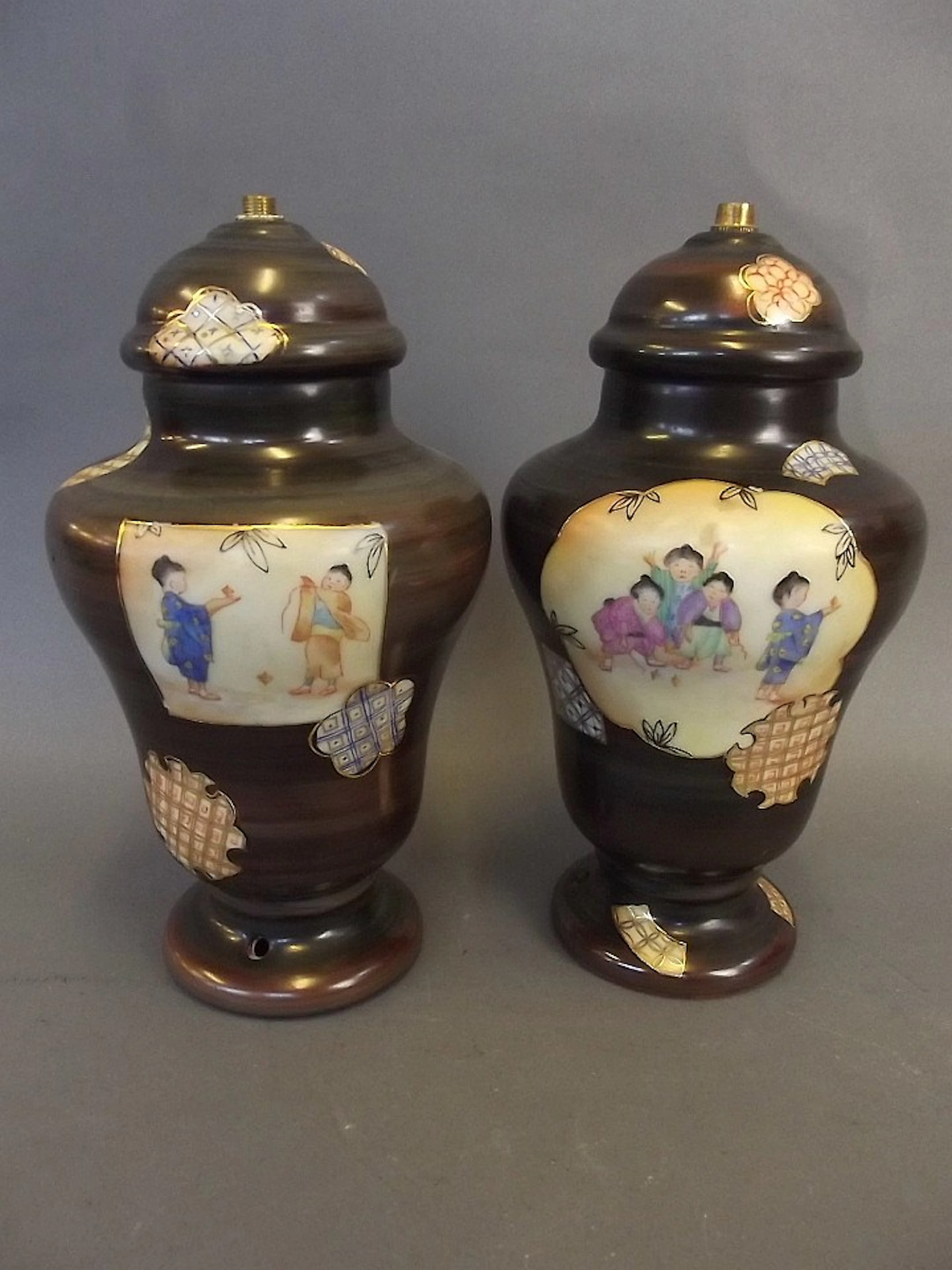 A pair of Limoges porcelain lamps with Japonaise...