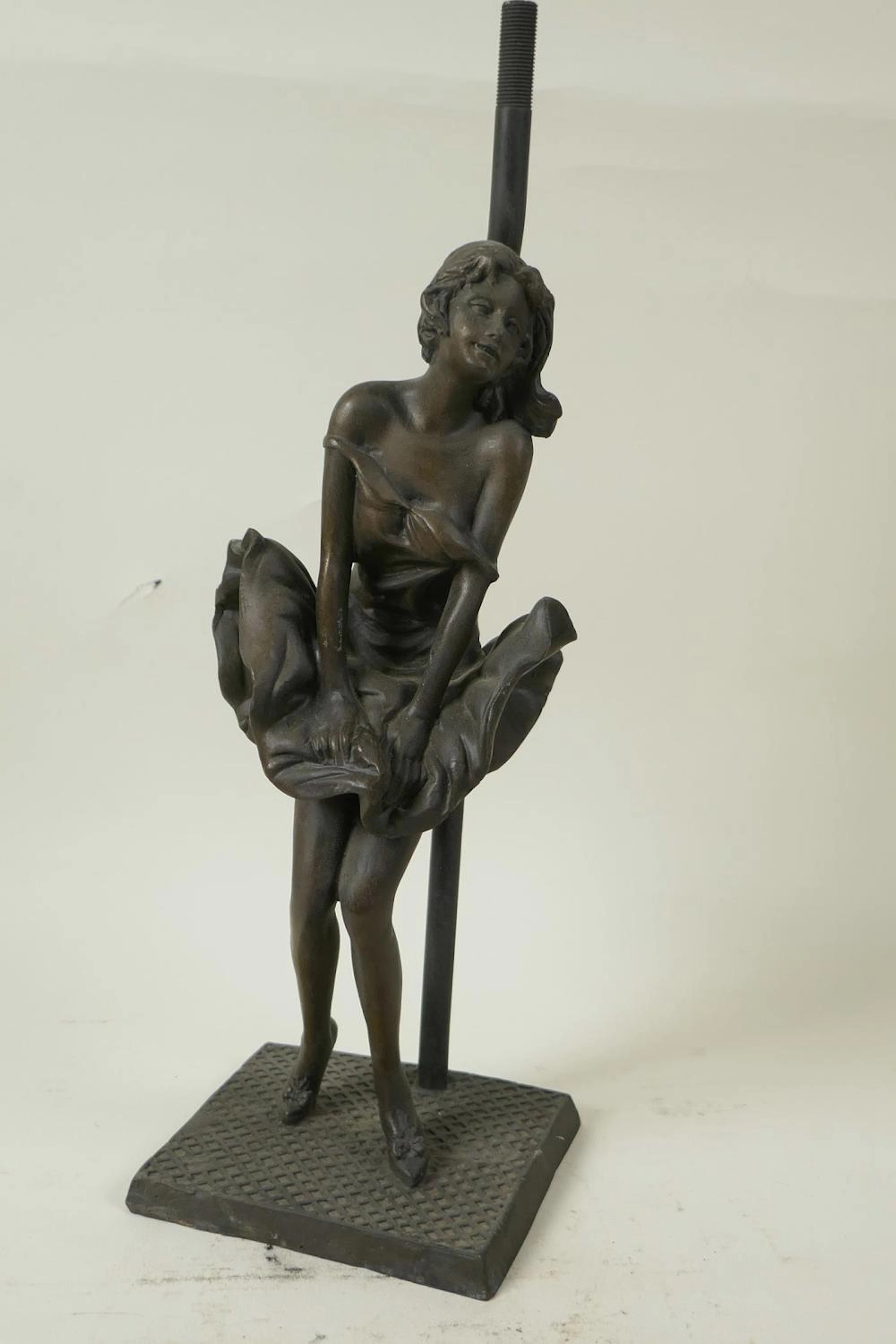 A bronzed metal figural table lamp base