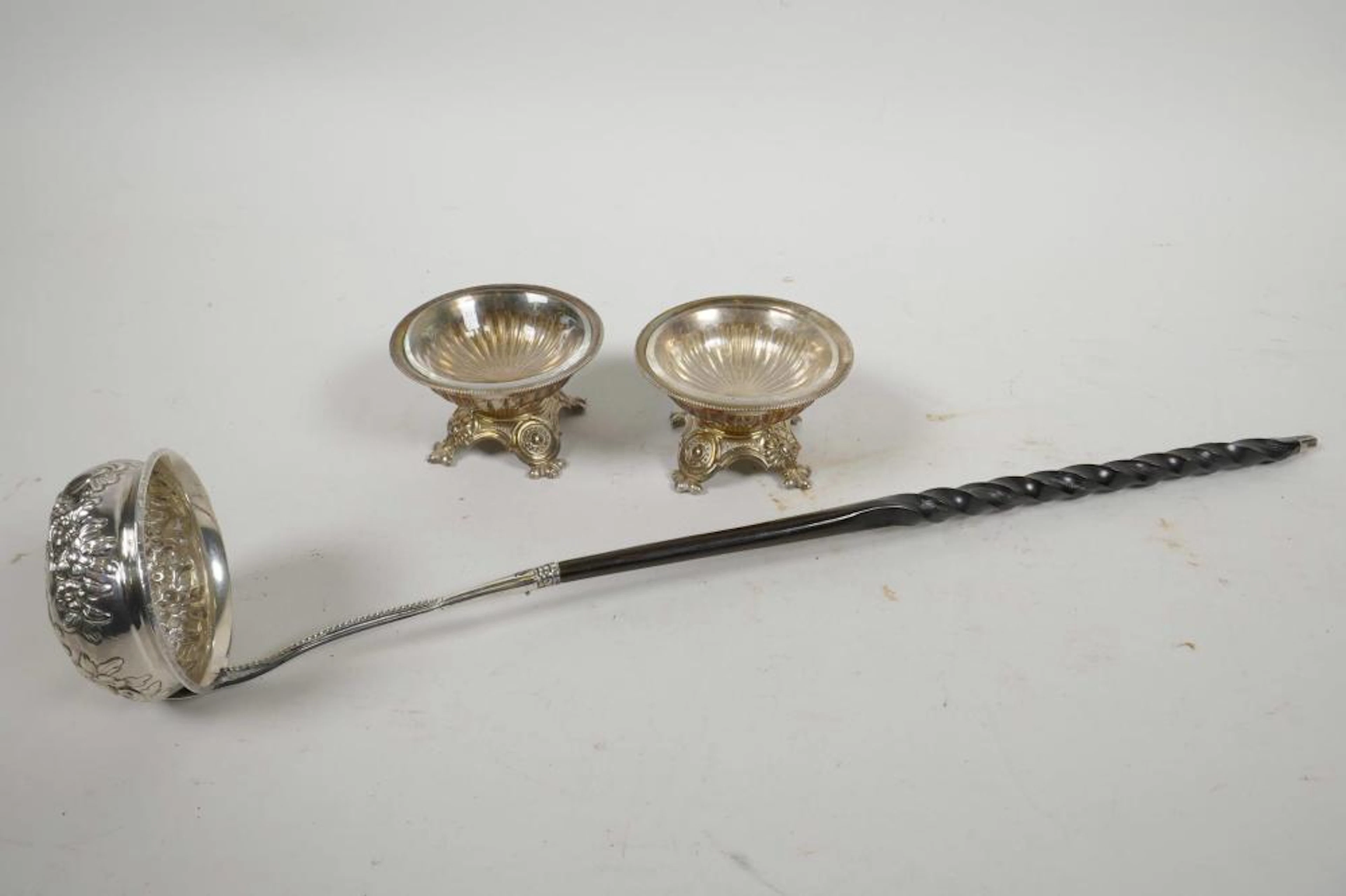A Georgian silver brandy ladle inset with a coin