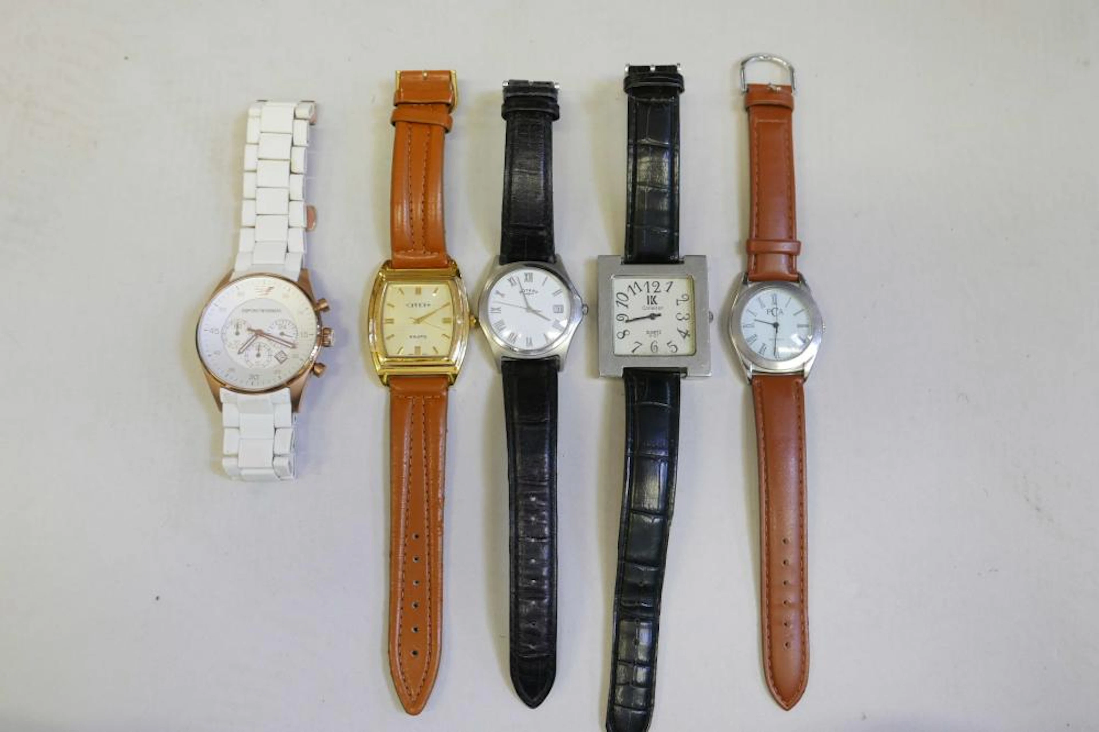 A gentleman's rose gold plated Emporio Armani wristwatch and strap