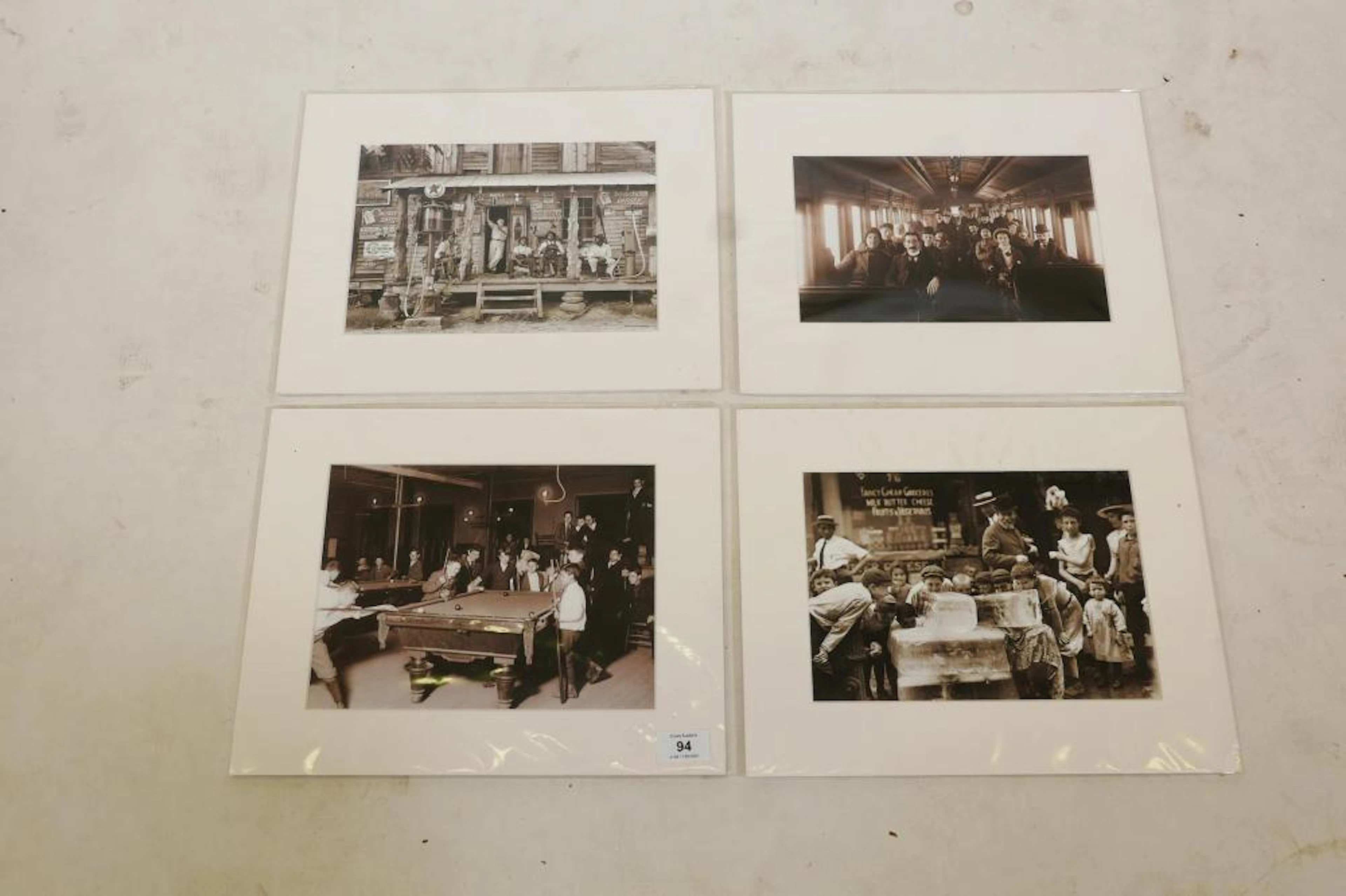 A set of four photographic prints from the original photographs