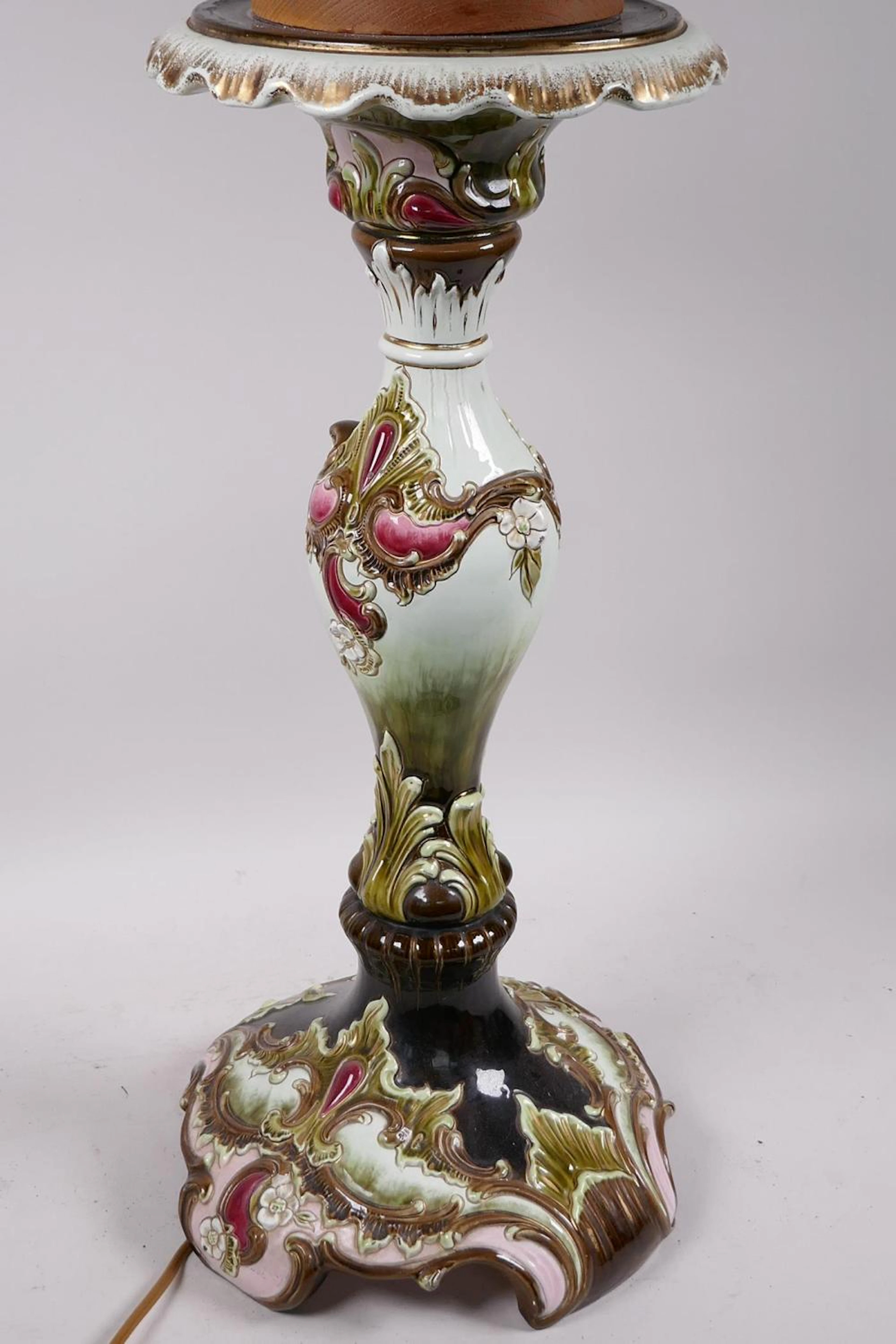 An Austrian Amphora lamp base moulded with a leaf design...