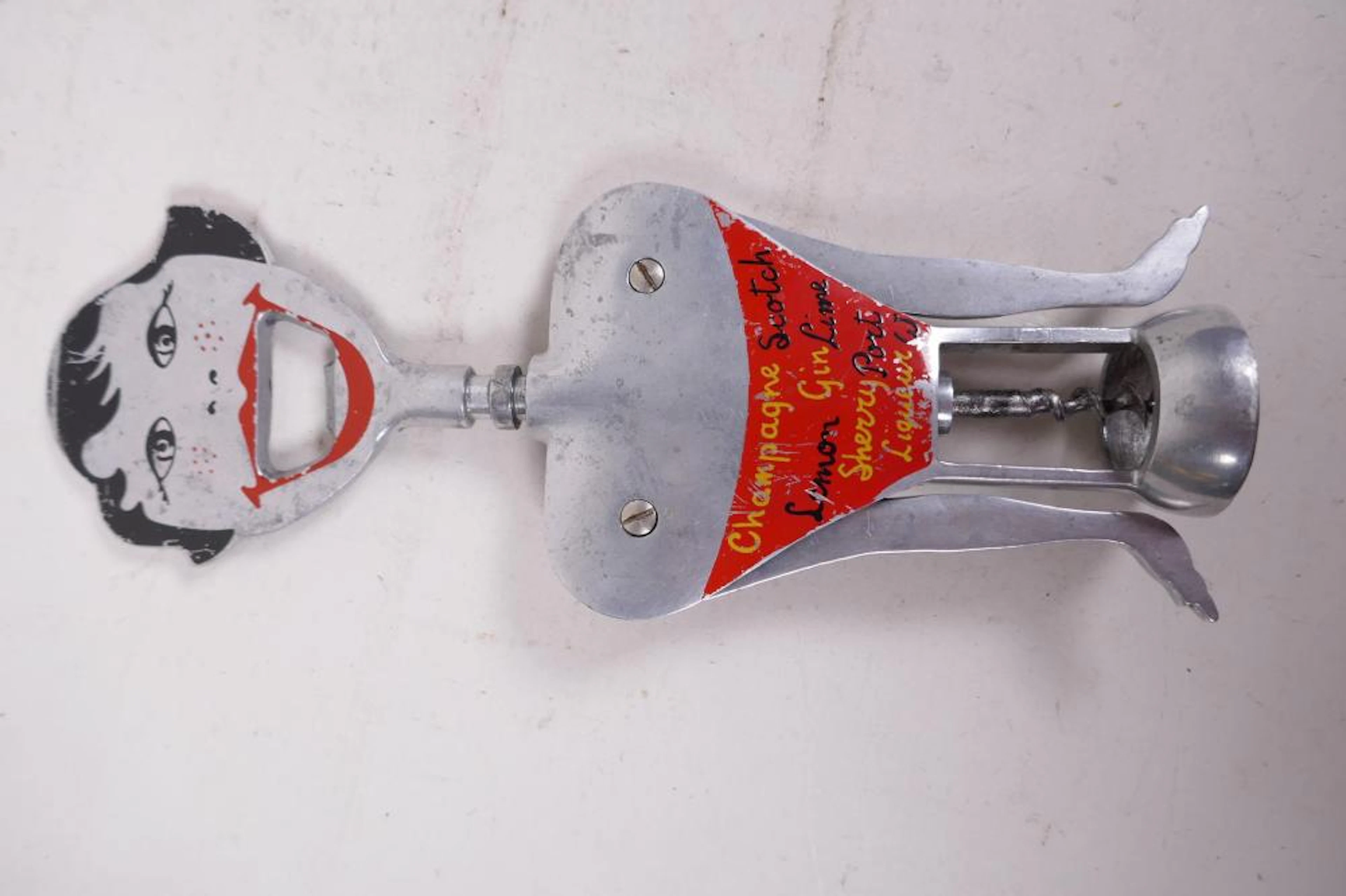A 1950s bottle opener and corkscrew by Carlo Gemelli, 'Lulu', 9½" long