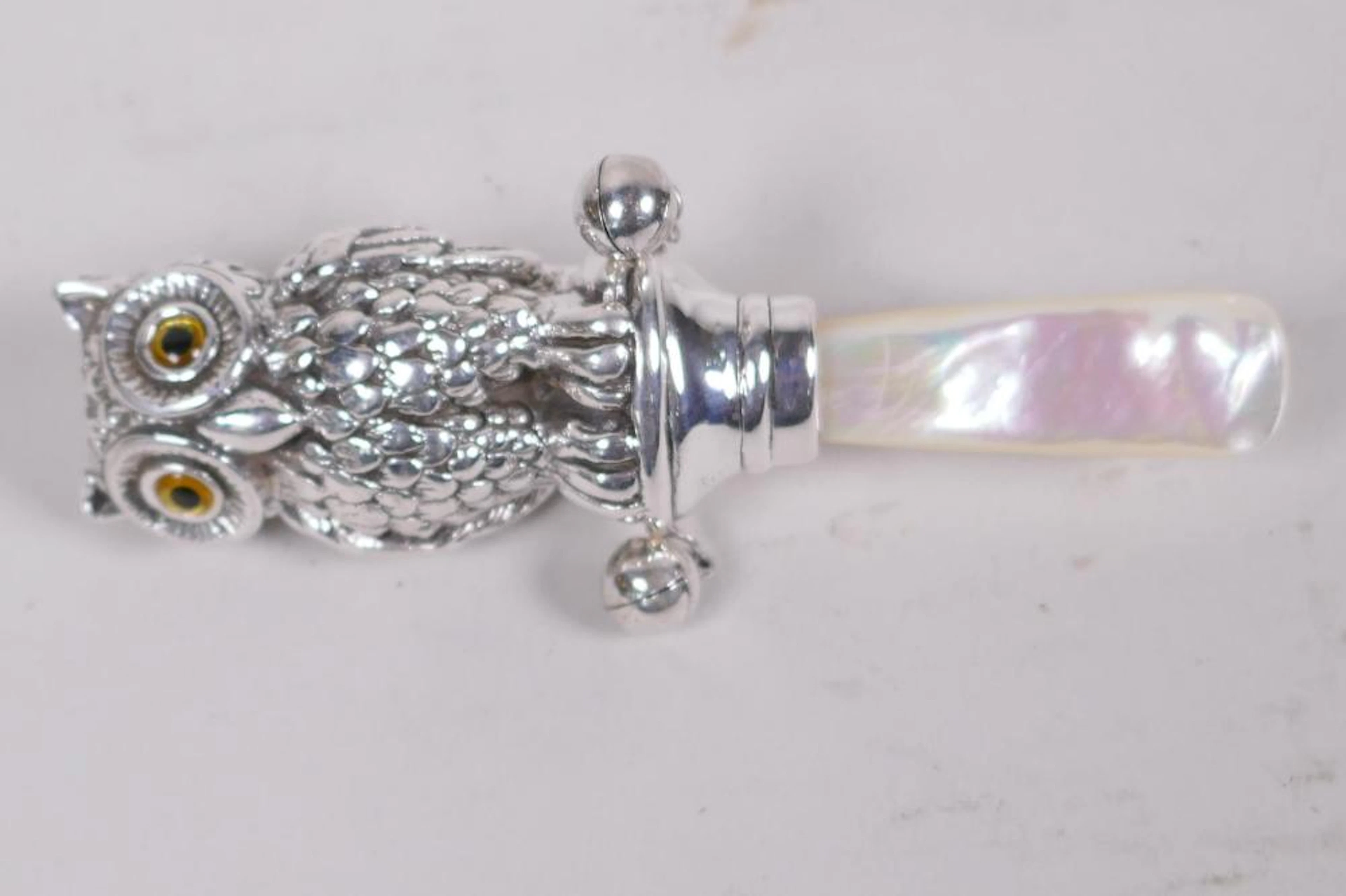 A replica Victorian style sterling silver and mother of...