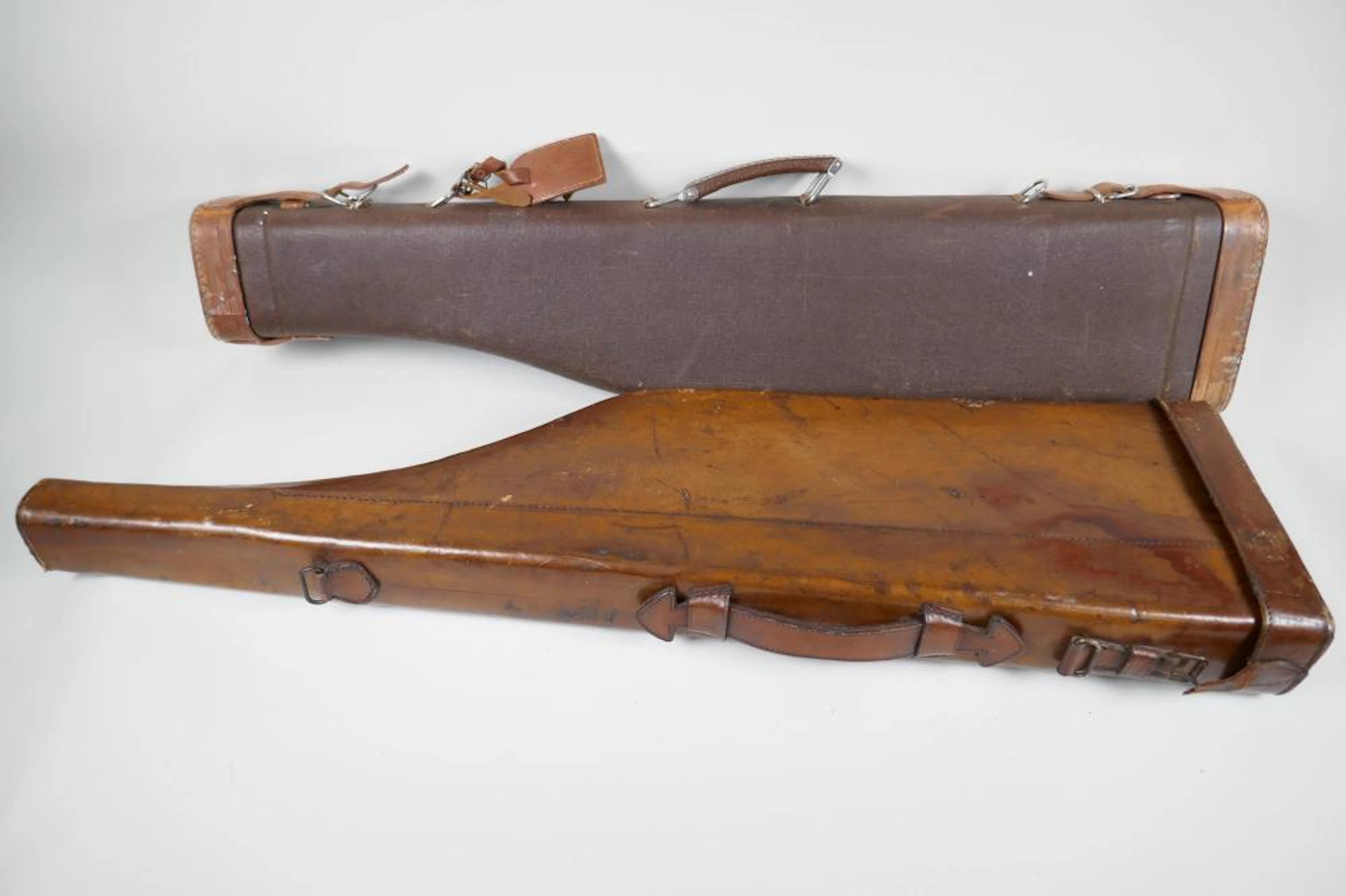 An antique leather 'Leg of Mutton' shotgun case