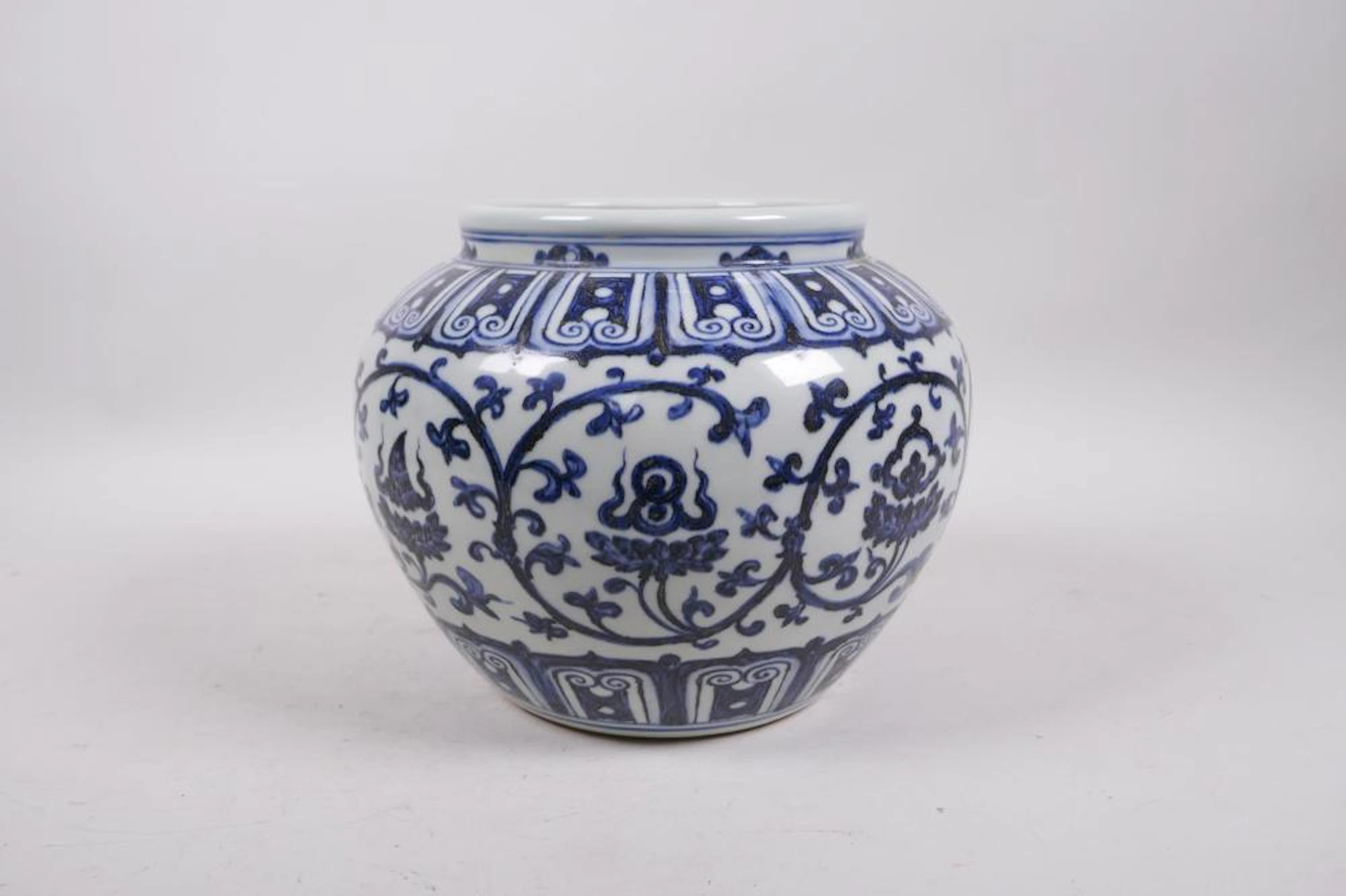 A Ming style blue and white porcelain jar decorated with...