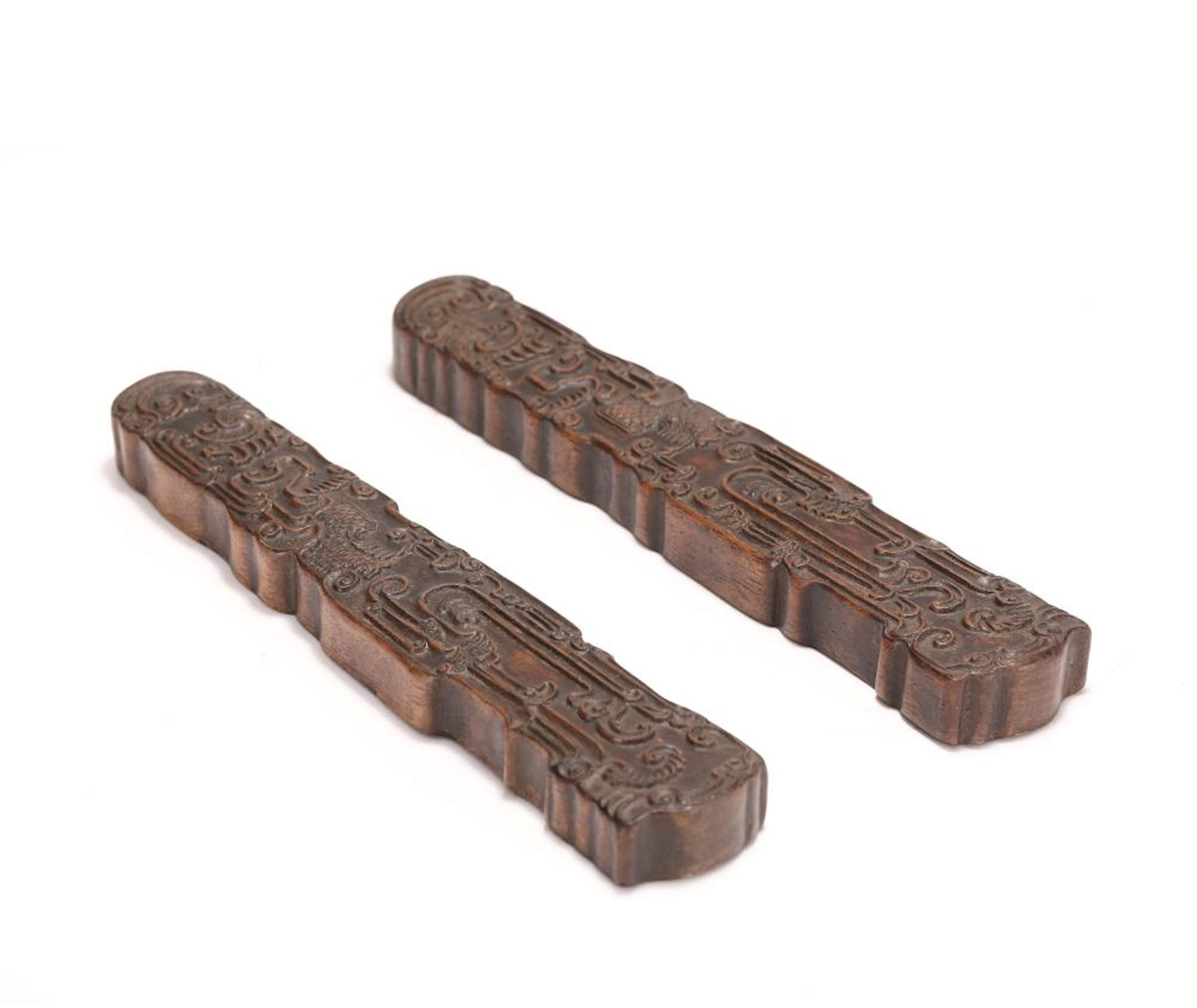 A PAIR OF CHINESE WOODEN PAPER WEIGHT