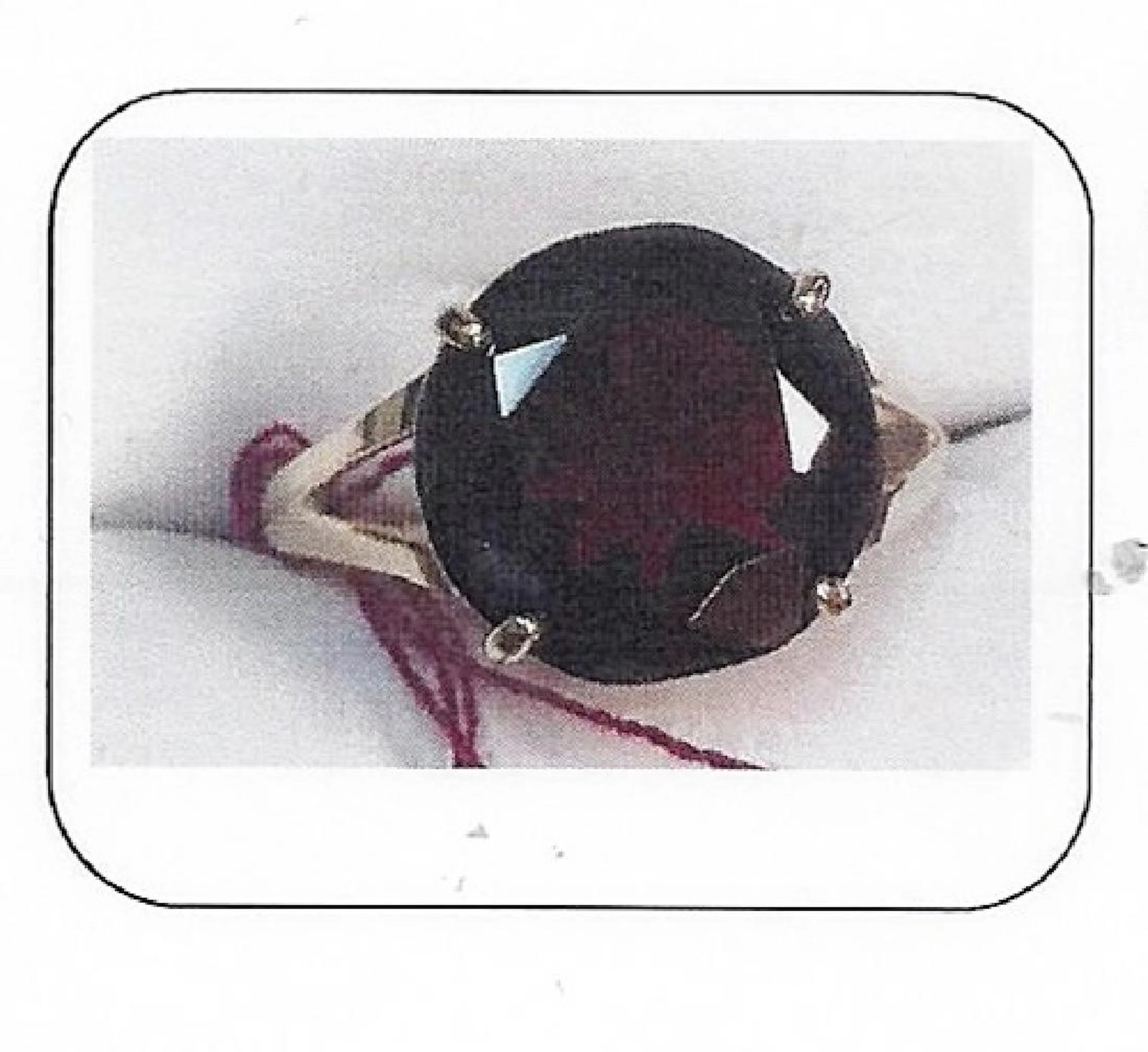 Lady's 14K yellow gold garnet ring