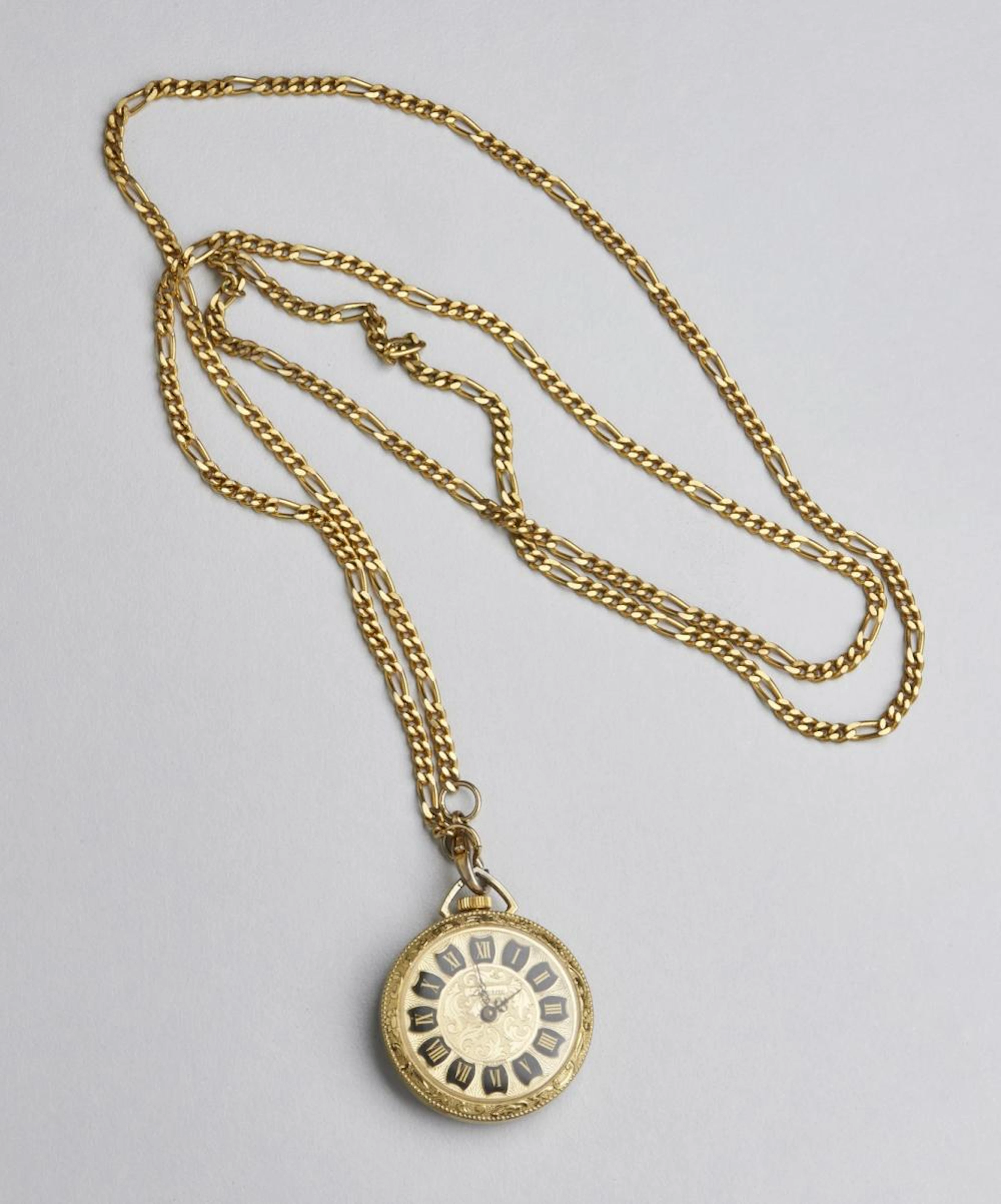 Orologio da tasca di forma rotonda in metallo giallo