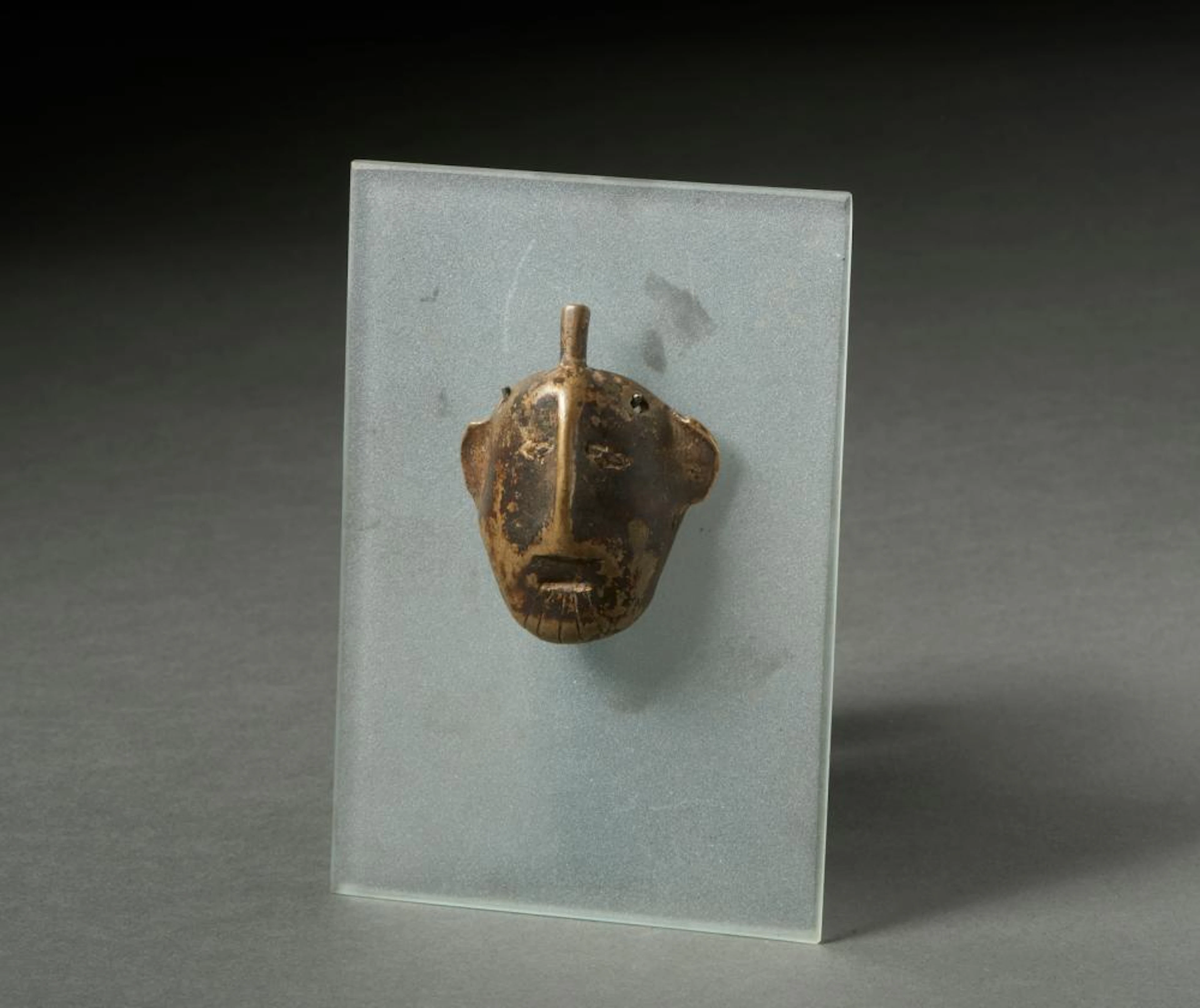 Indian Art India, Nagaland. Copper alloy head hunter necklace pendant.