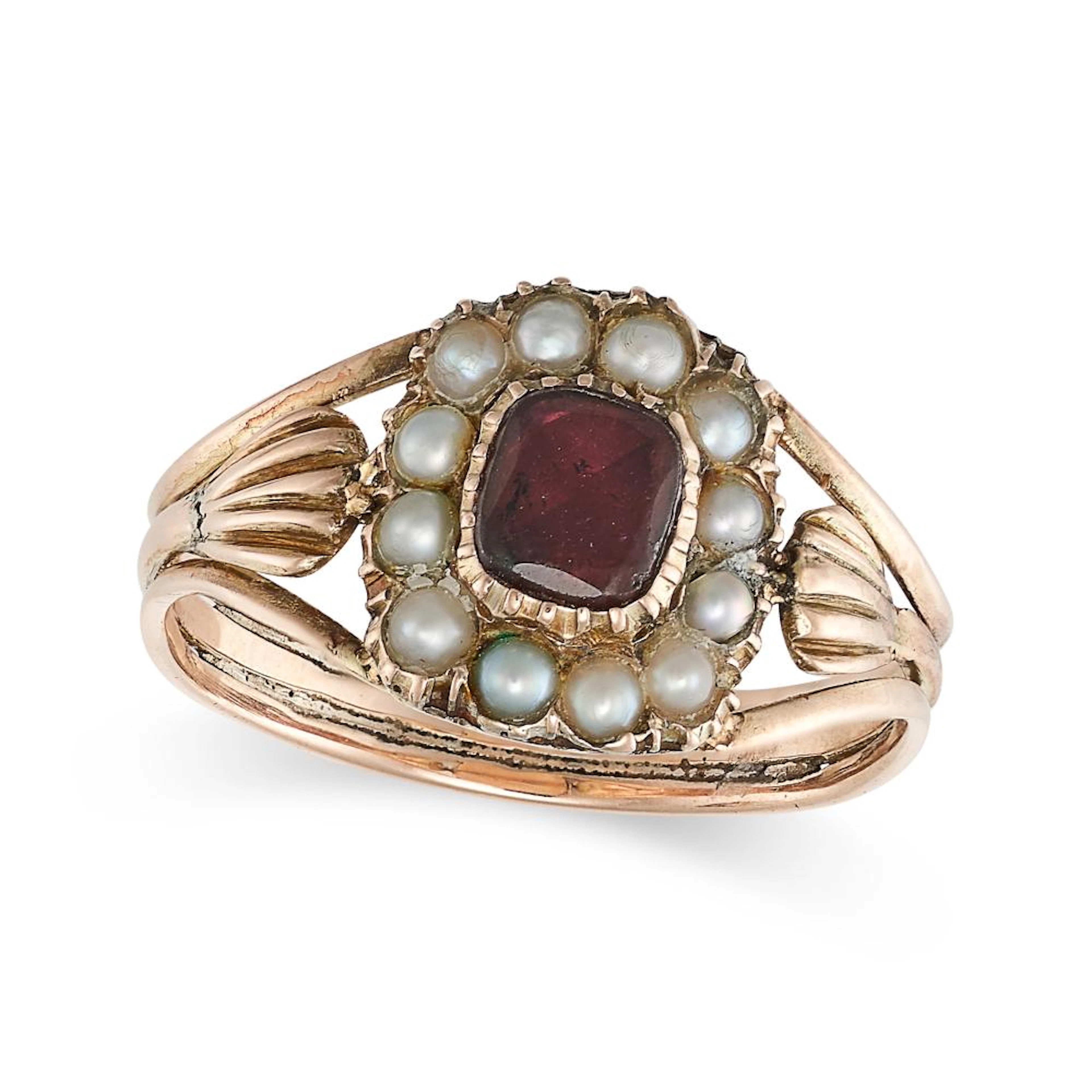 AN ANTIQUE GARNET AND PEARL RING