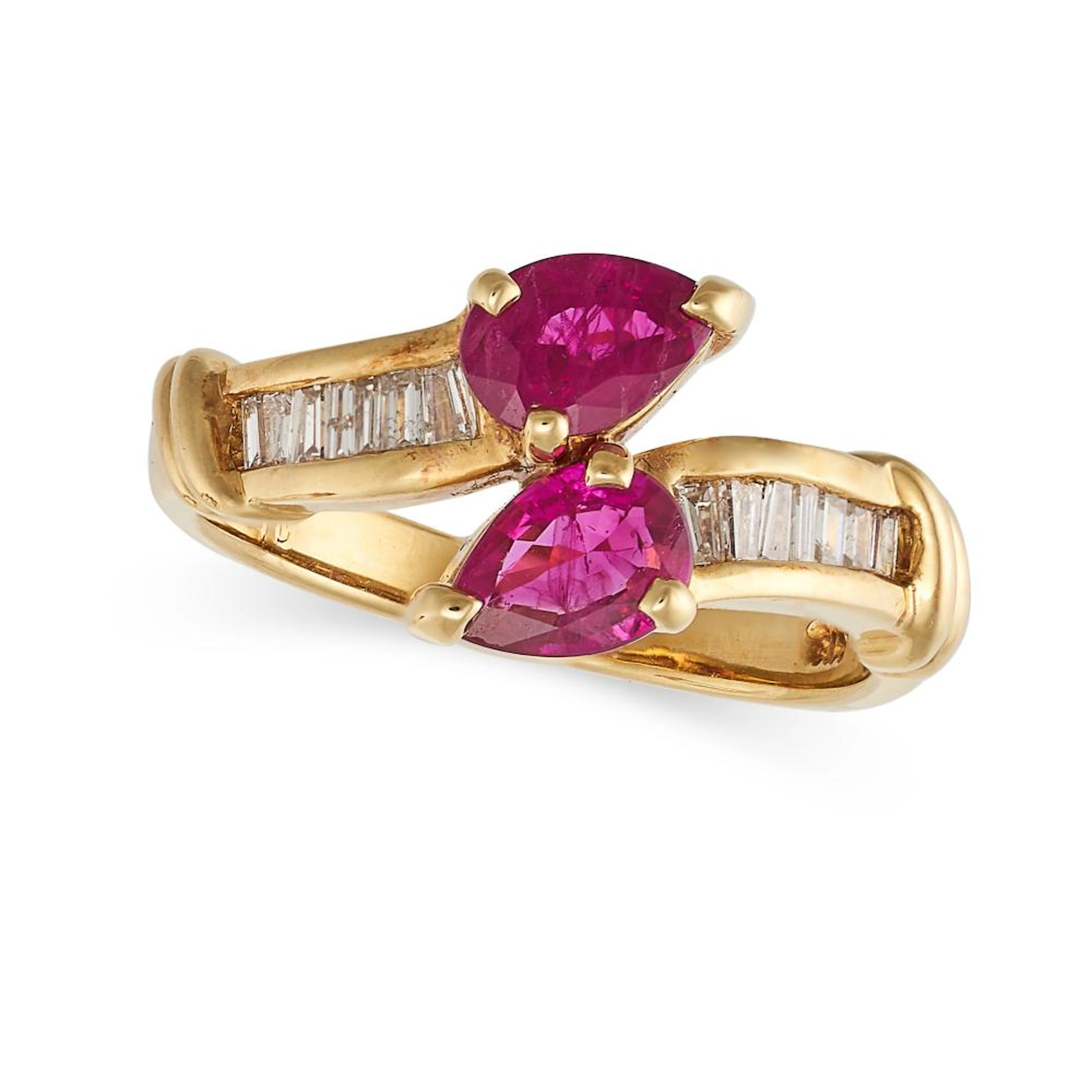 A RUBY AND DIAMOND CROSSOVER RING in 18ct yellow gold