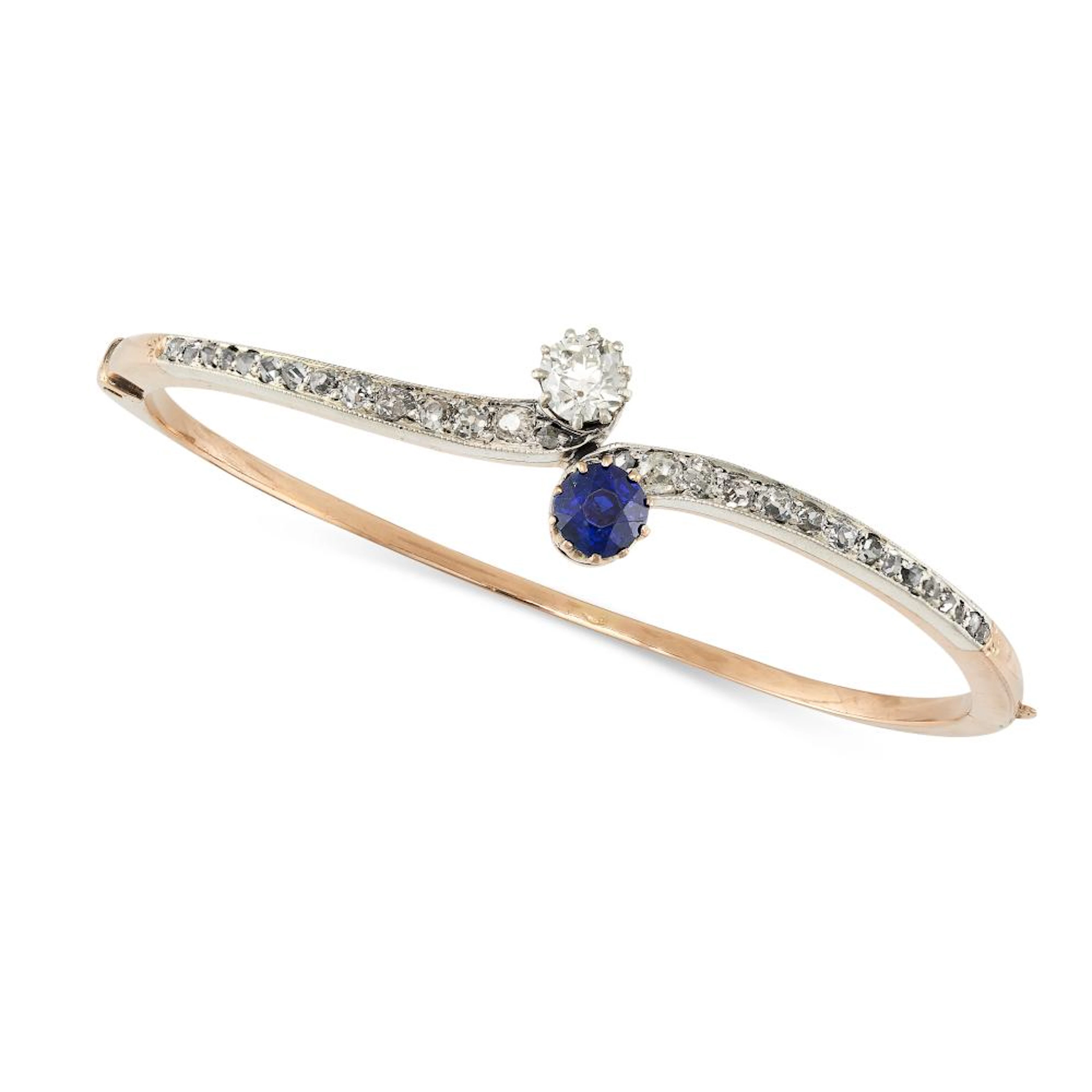 AN ANTIQUE SAPPHIRE AND DIAMOND BANGLE in yellow gold