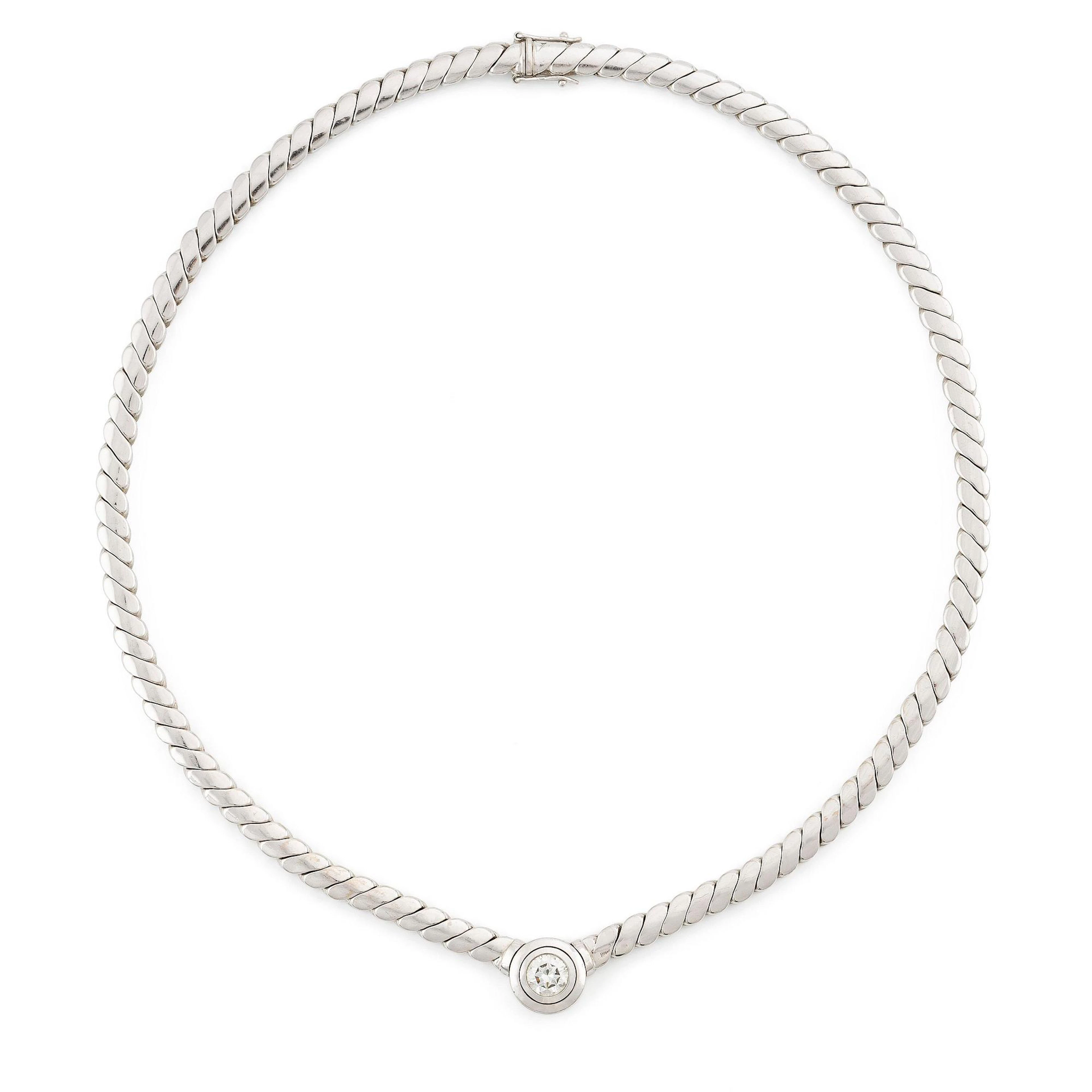 An 18K white gold necklace set with a round brilliant-cut diamond
