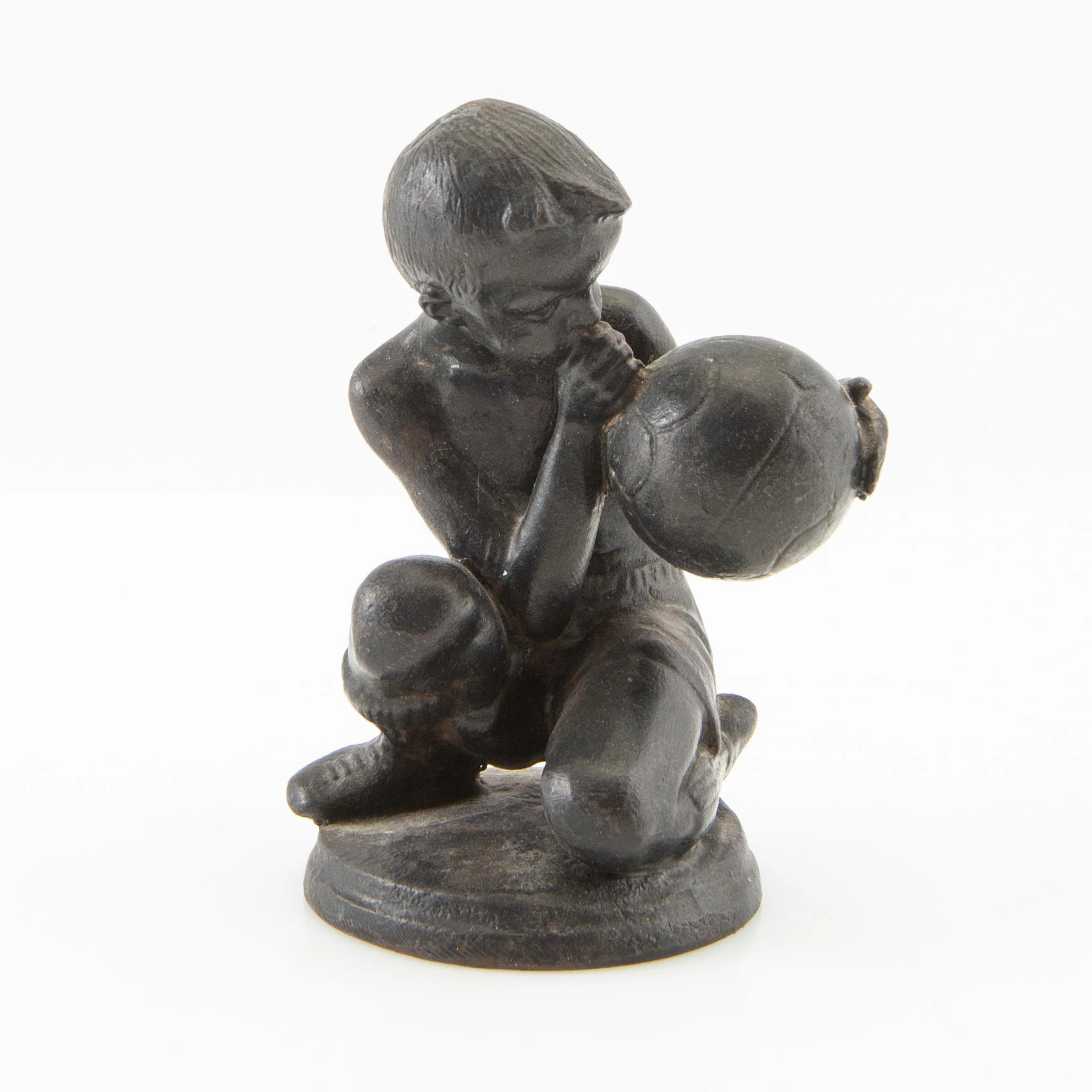 Sculpture Boy with Balloon