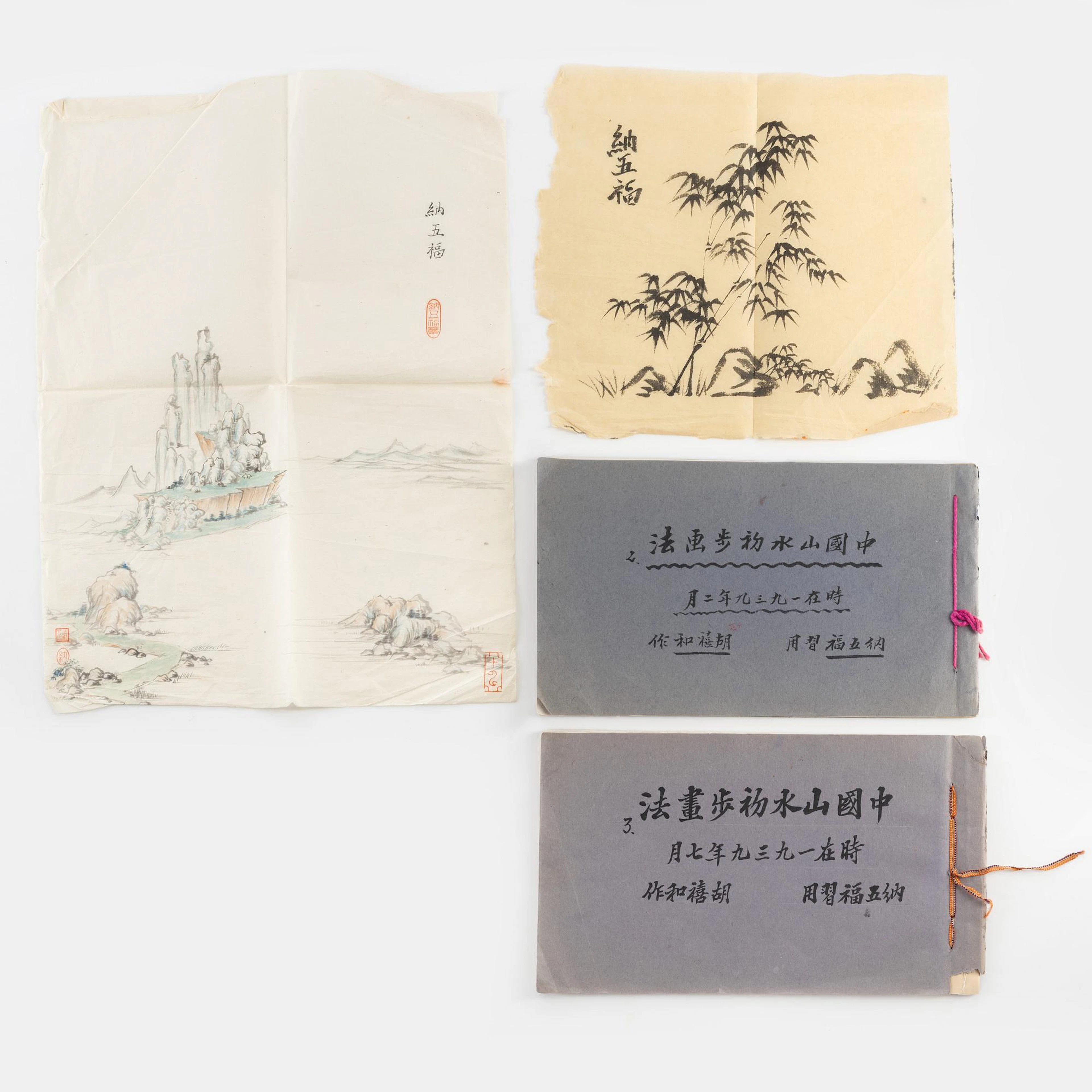 Two Chinese books with ink wash paintings