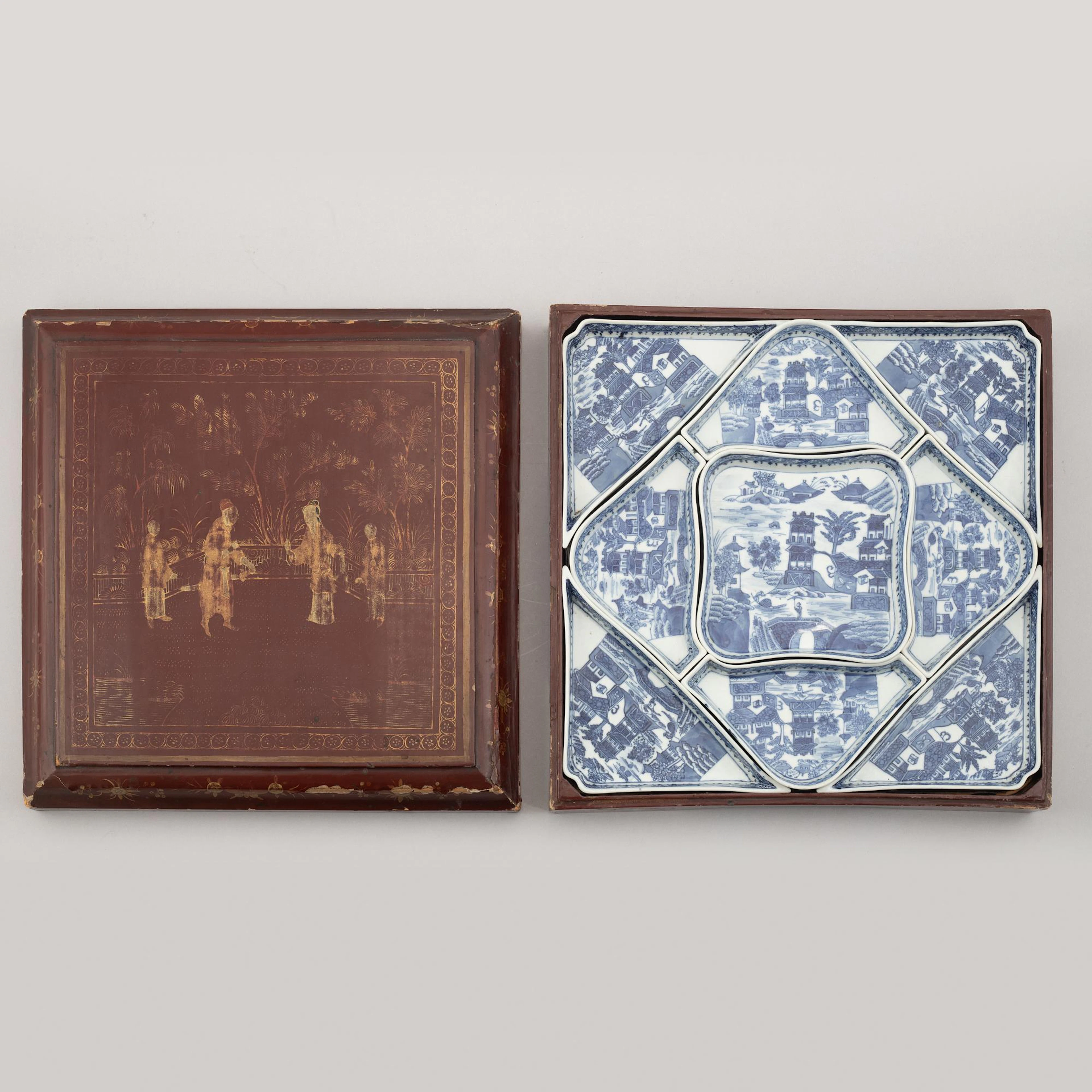 A nine piece Chinese porcelain cabaret in its original lacquer box