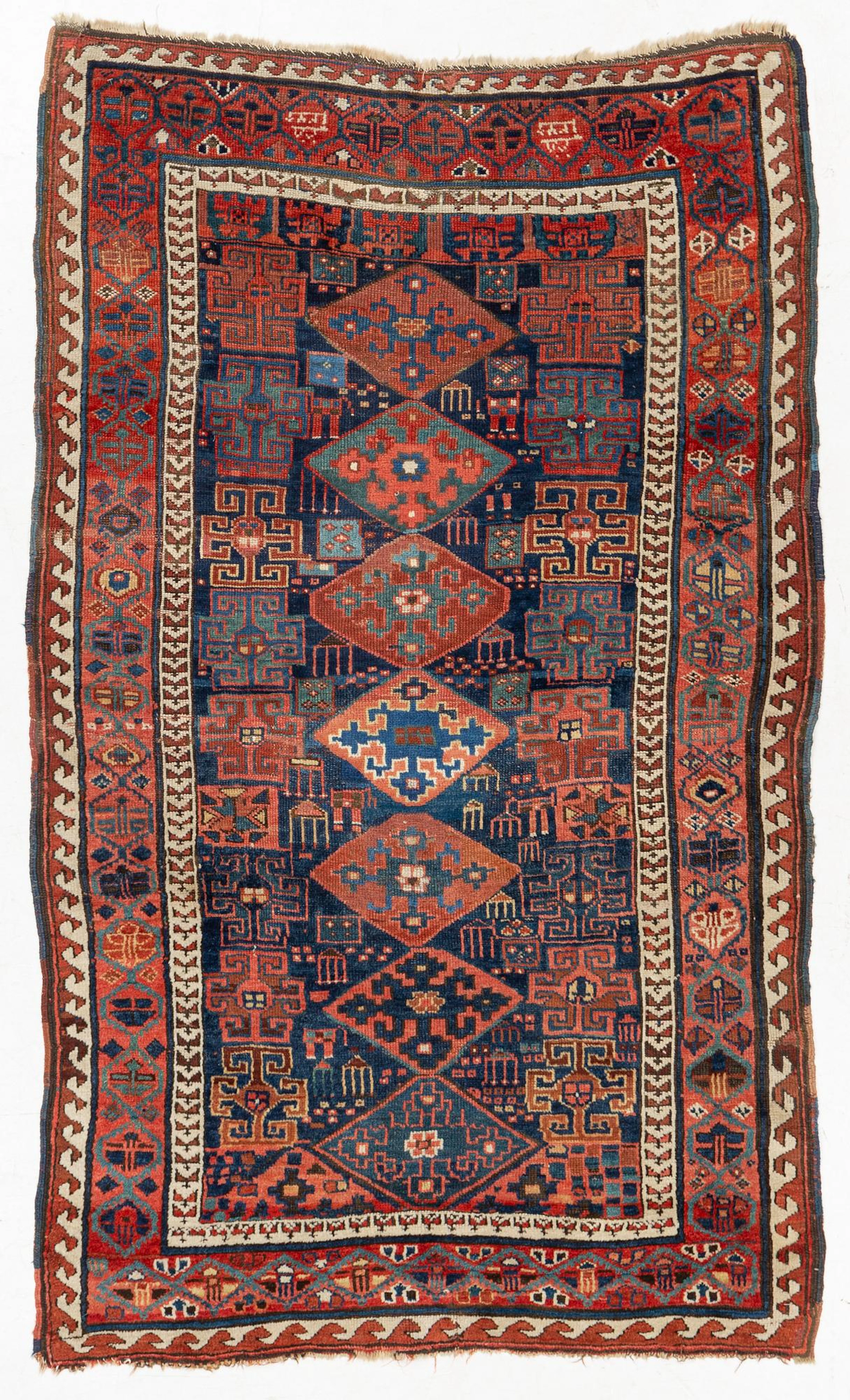 An antique Kurdish / Turkish carpet by the Herki Tribe, c 233 x 137 cm
