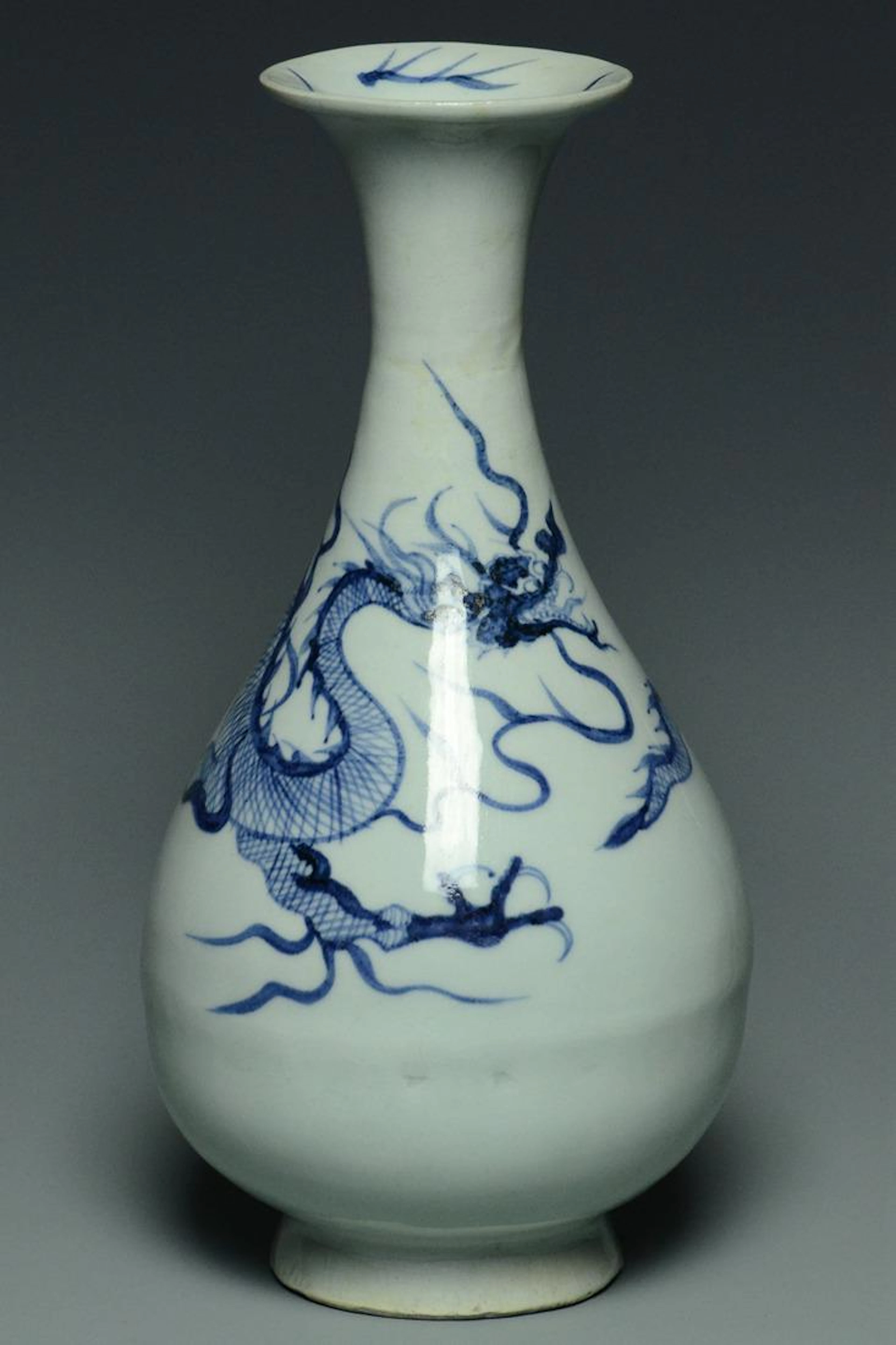 A yuan dynasty blue and white dragon vase