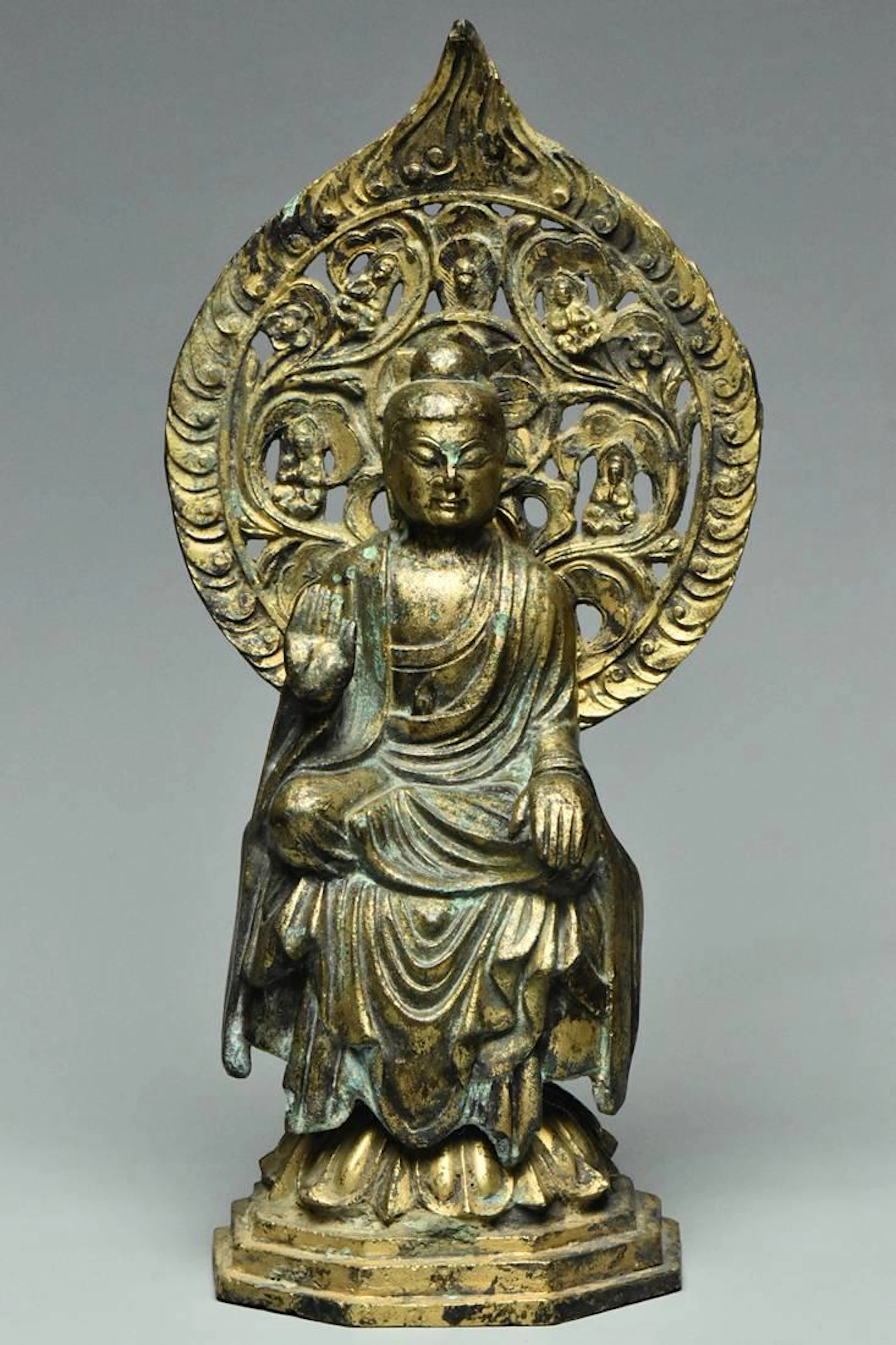 A tang dynasty gilt bronze figure of buddha