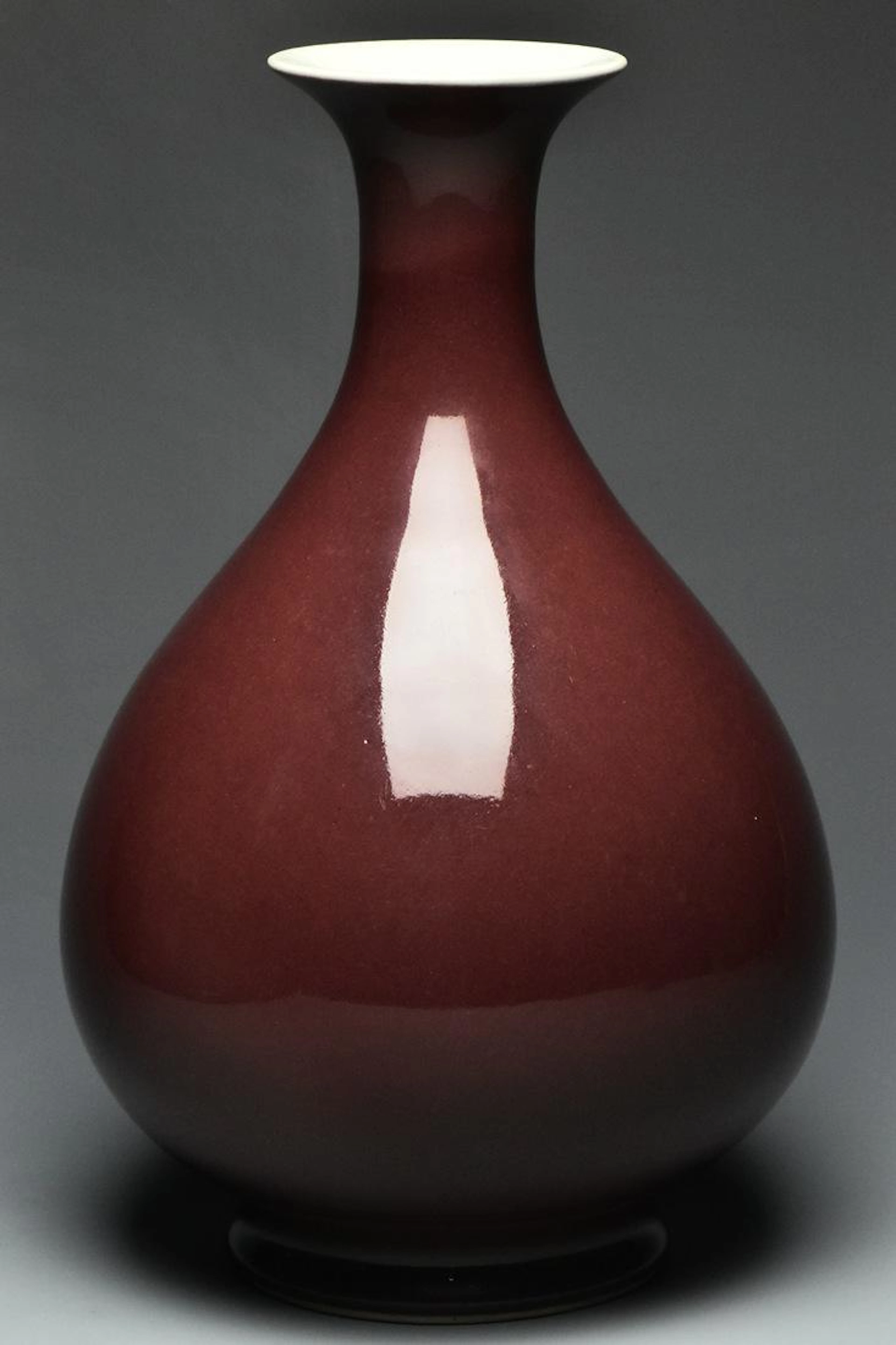 A qing dynasty red glazed vase qianlong mark