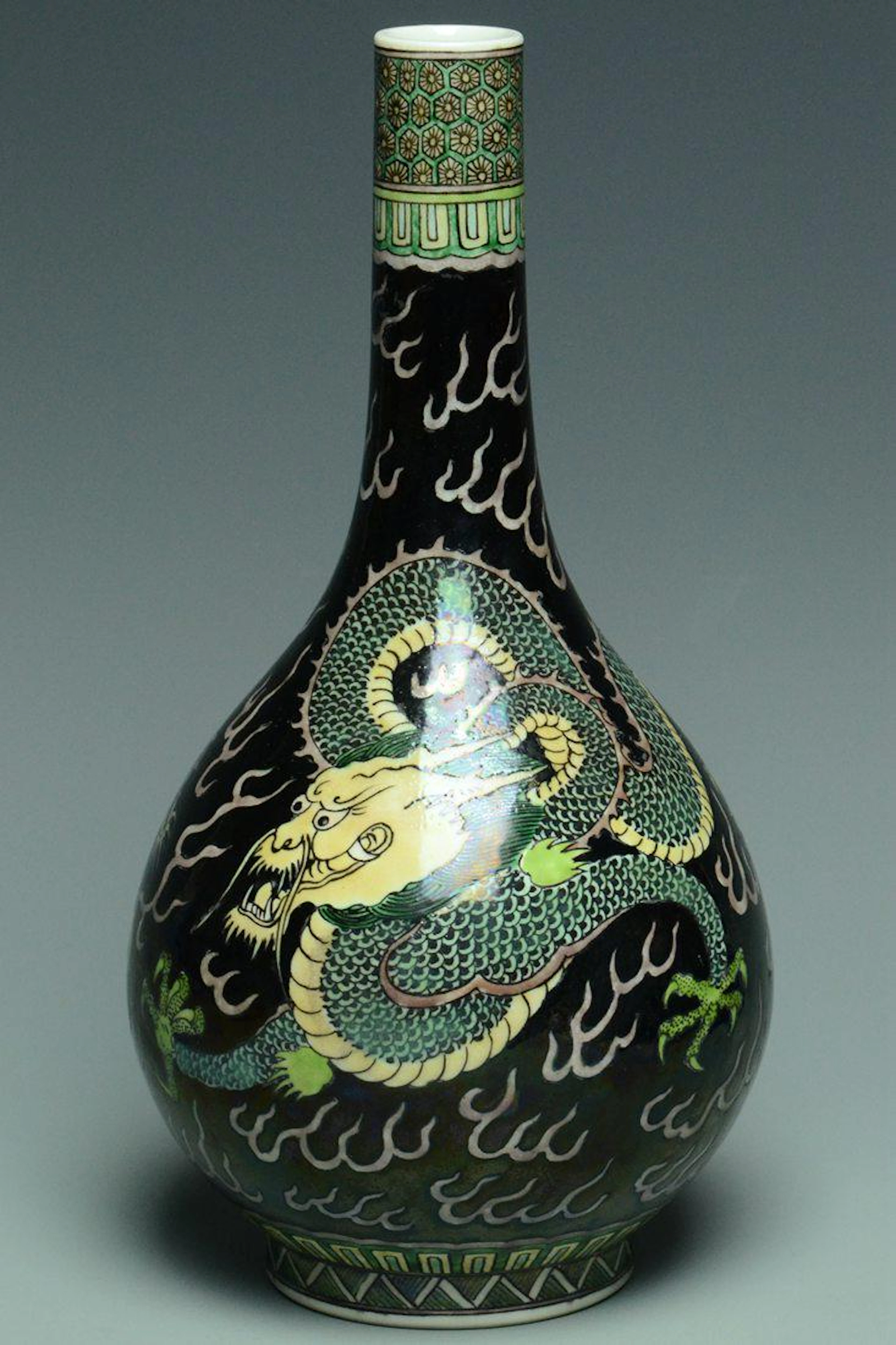 A famille noire dragon vase kangxi mark